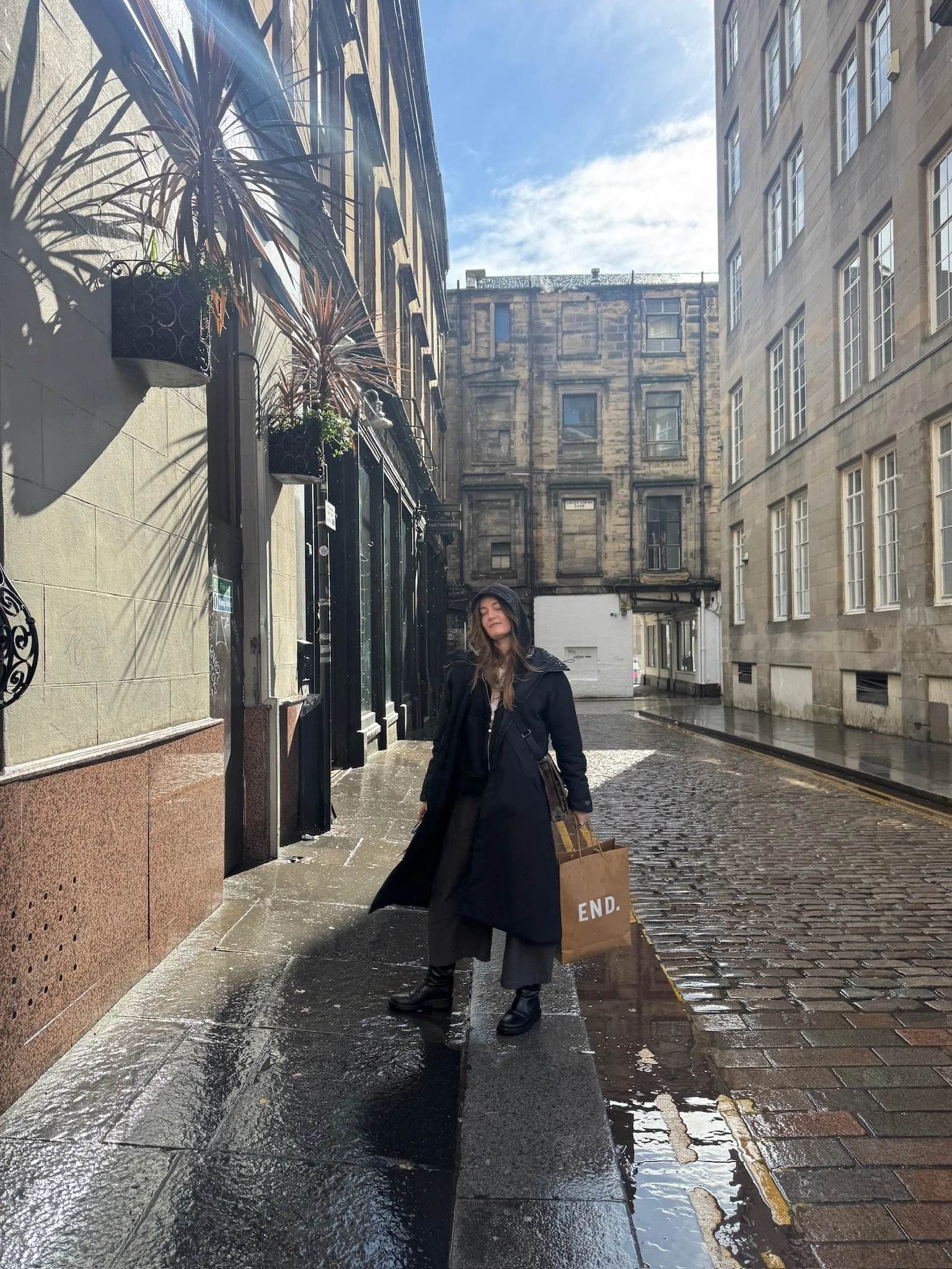 Woman walking in City Centre shopping in Glasgow Scotland