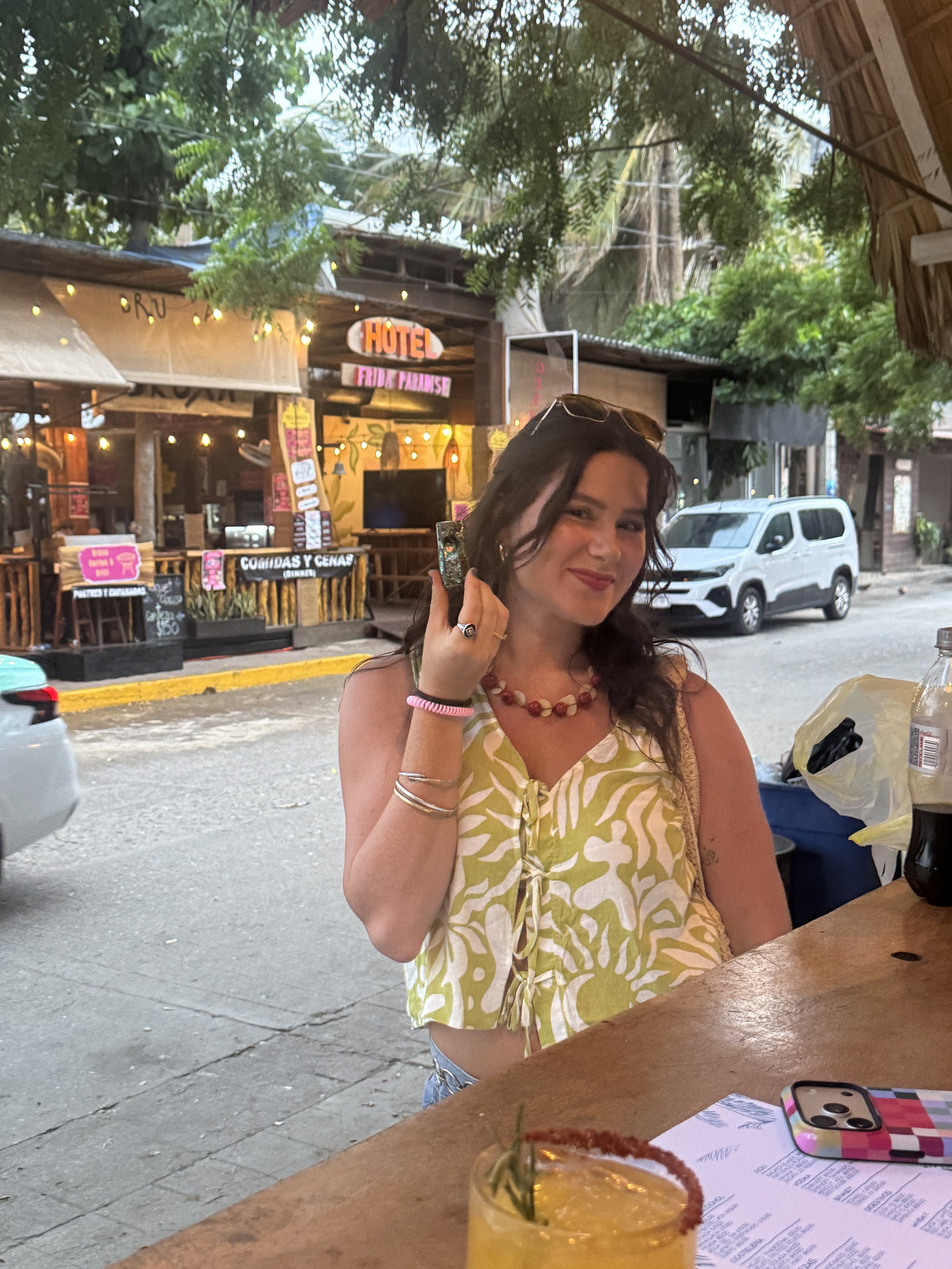 Sipping a margarita at a streetside restaurant in La Punta, Puerto Escondido