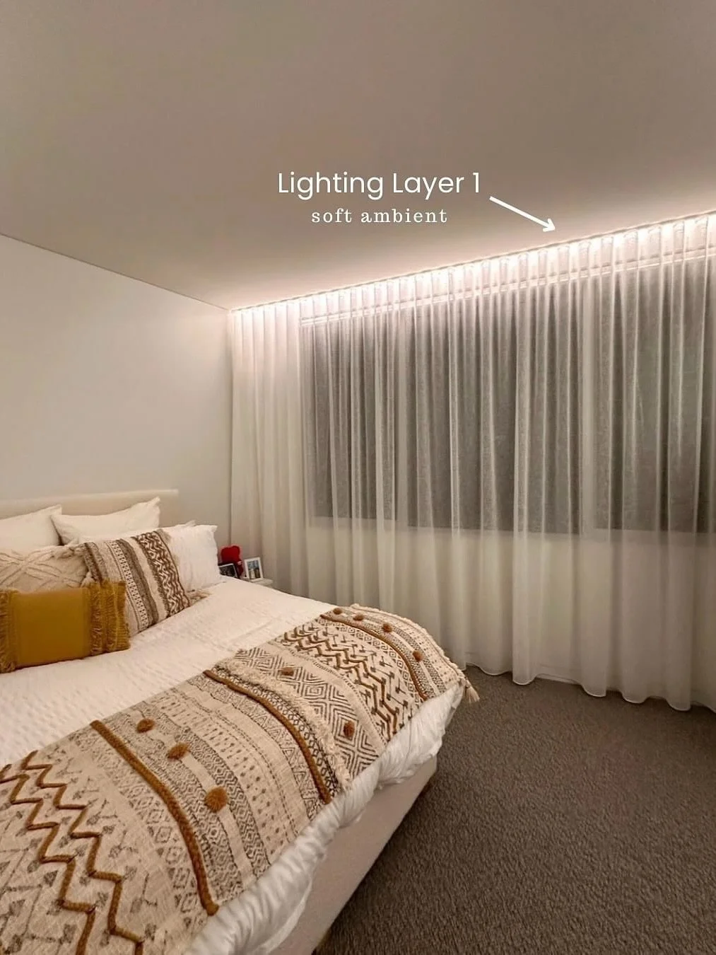 The smaller bedrooms in our Sandstone Project combine three light sources - linear light that grazes the sheer curtains, offering soft ambient illumination, indirect up light adding brightness, and a spotlight that will highlight artwork, providing f