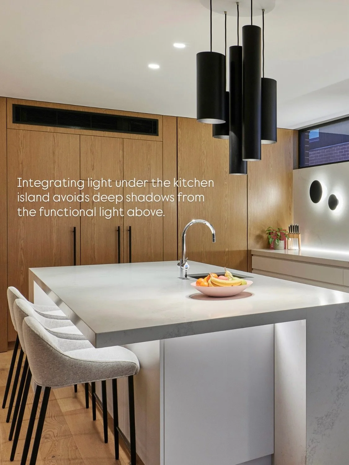 There are exceptions to my rule of not lighting floors and integrating light under the kitchen island is one. It will help avoid deep shadows from the functional light above, connect the island to the rest of the living space and provide a great nigh