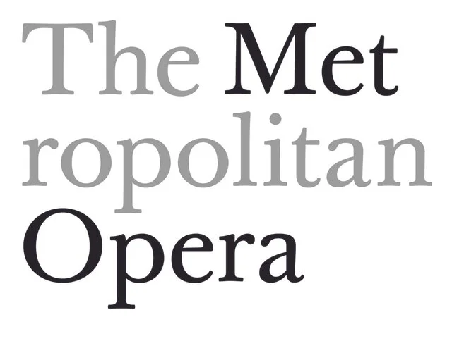 Text reading "The Metropolitan Opera" with "The Met" in gray, "ropolitan" in light gray, and "Opera" in black