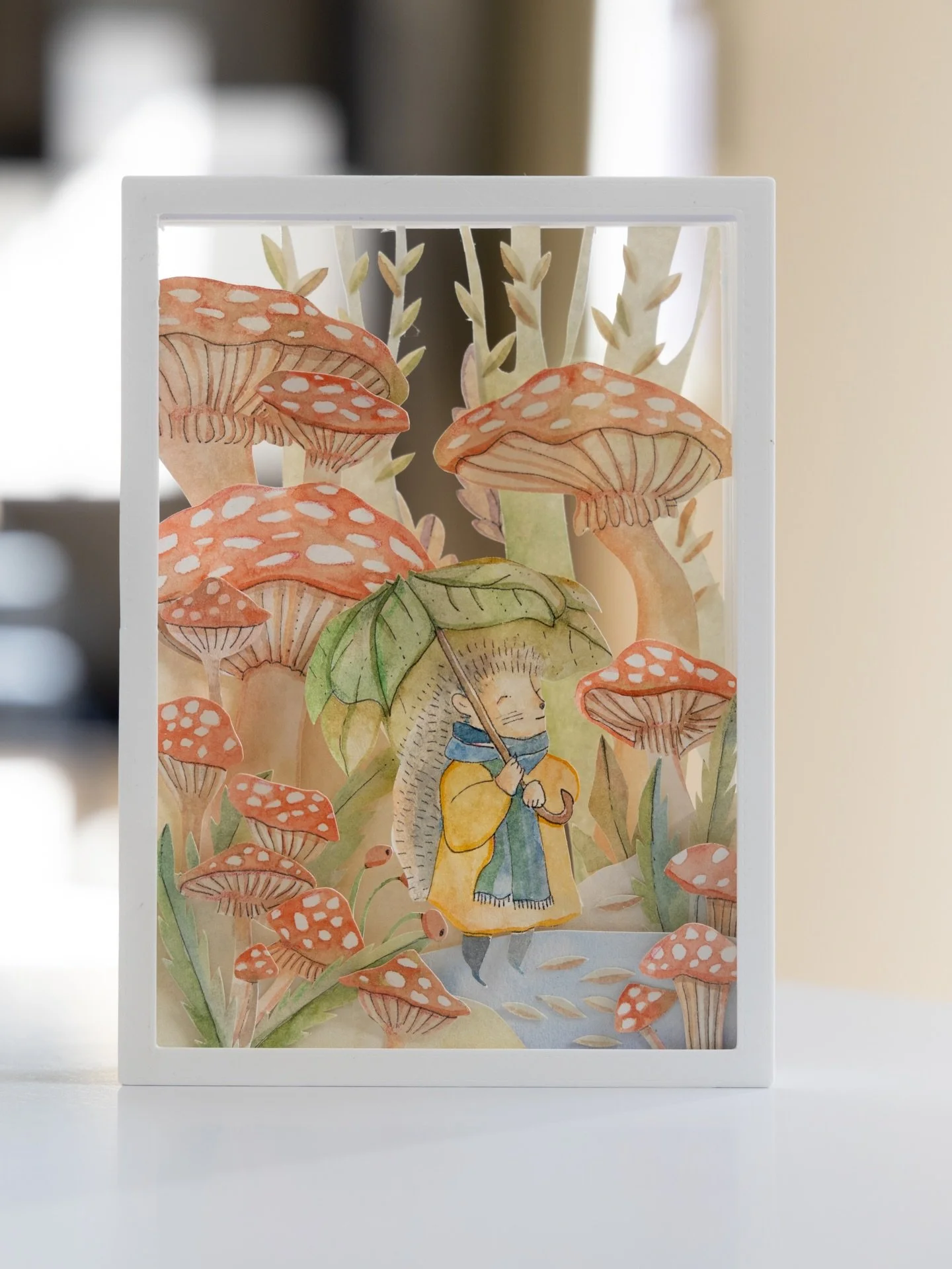Here&rsquo;s a little throwback to one of my favourite shadowboxes - a tiny hedgehog in his yellow rain jacket and scarf, wandering through a whole forest of mushrooms. I don&rsquo;t know why, but this one always makes me smile ✨

It&rsquo;s just thr