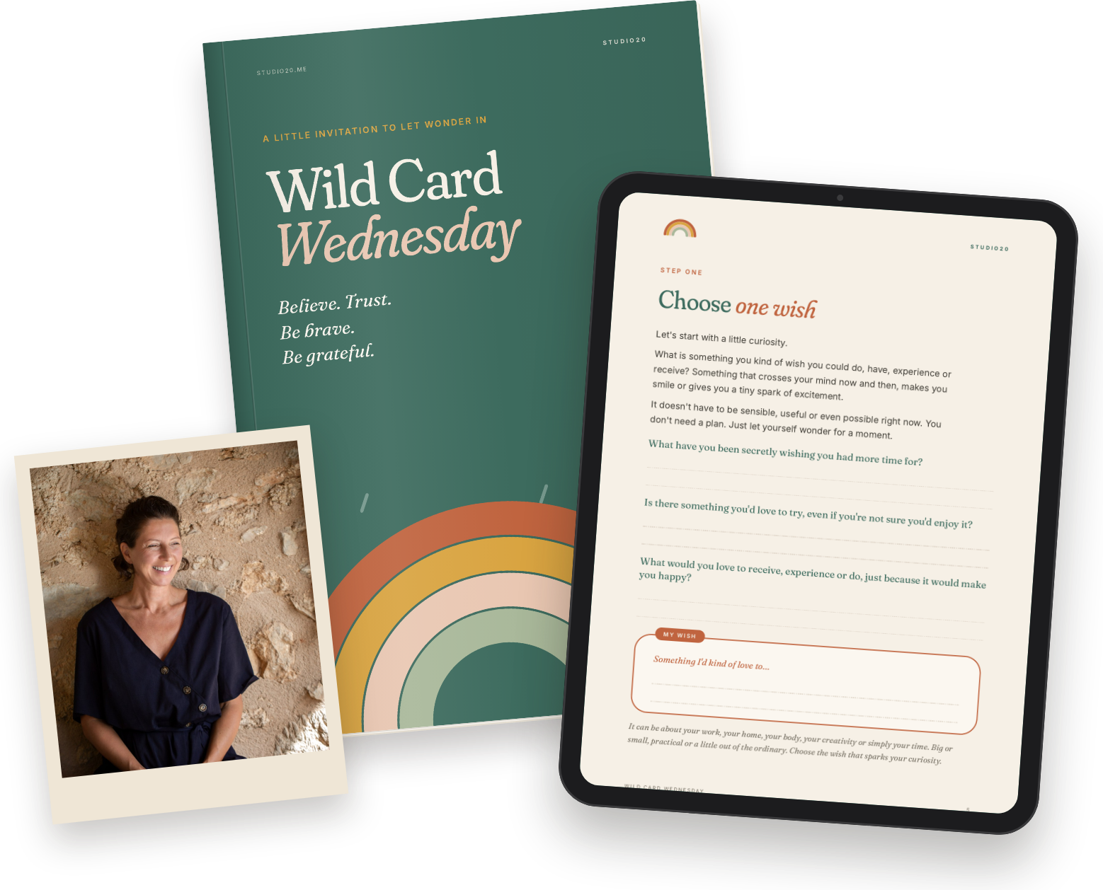 Marianne de Kuyper smiling against a stone wall, with the Wild Card Wednesday guide from Studio20 open on a tablet.