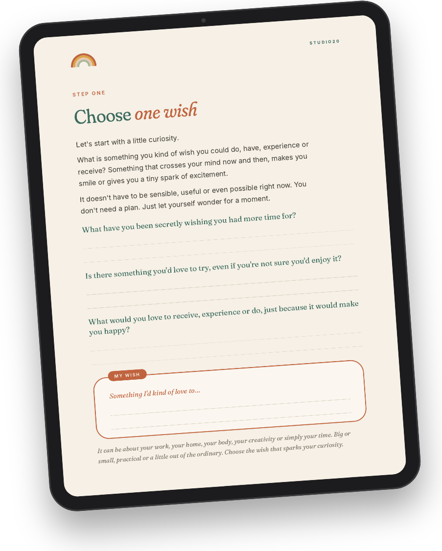 A tablet showing the "Choose one wish" page from the Wild Card Wednesday ebook by Studio20.