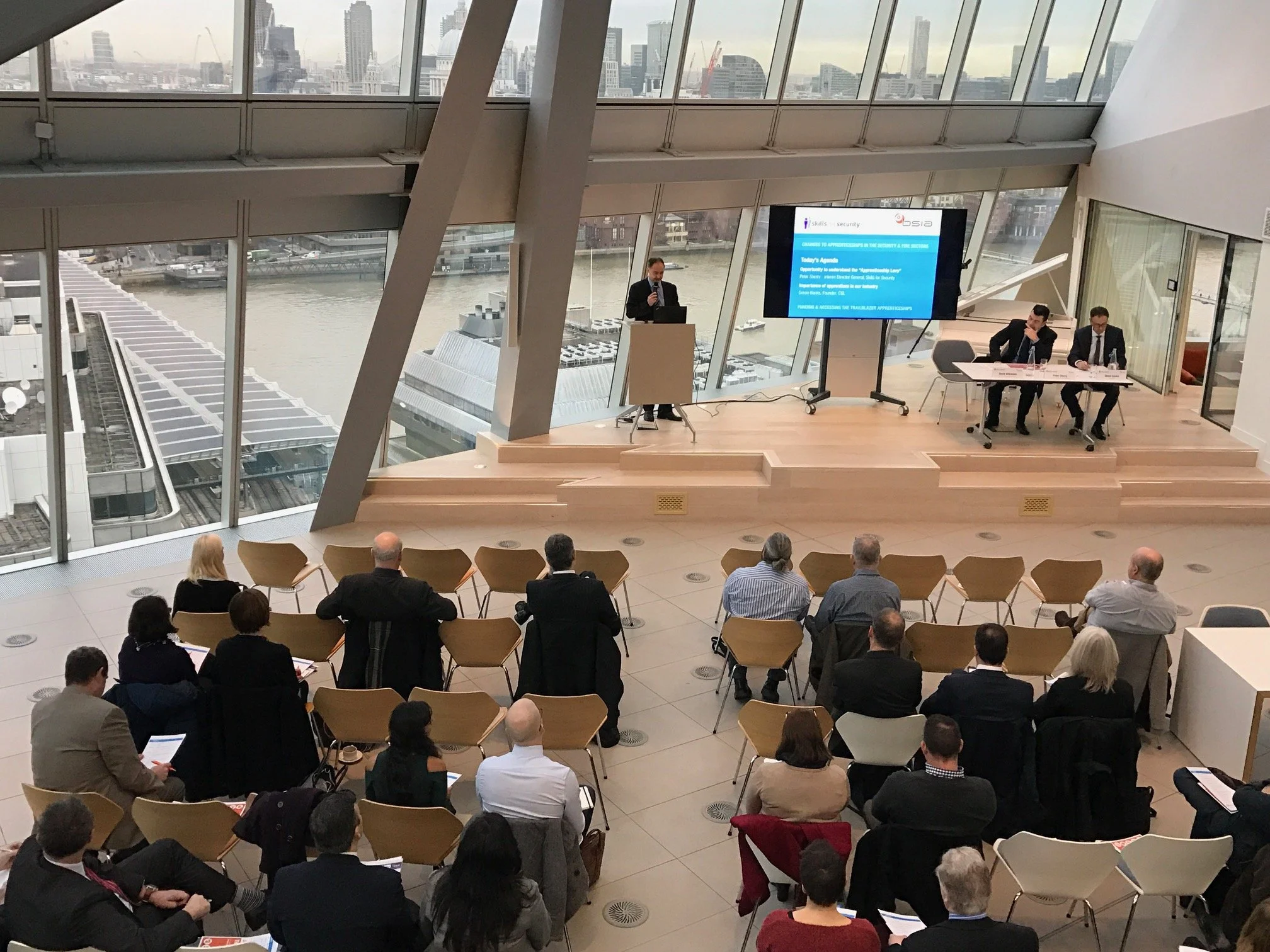 Conference in large glass building in Lonndon