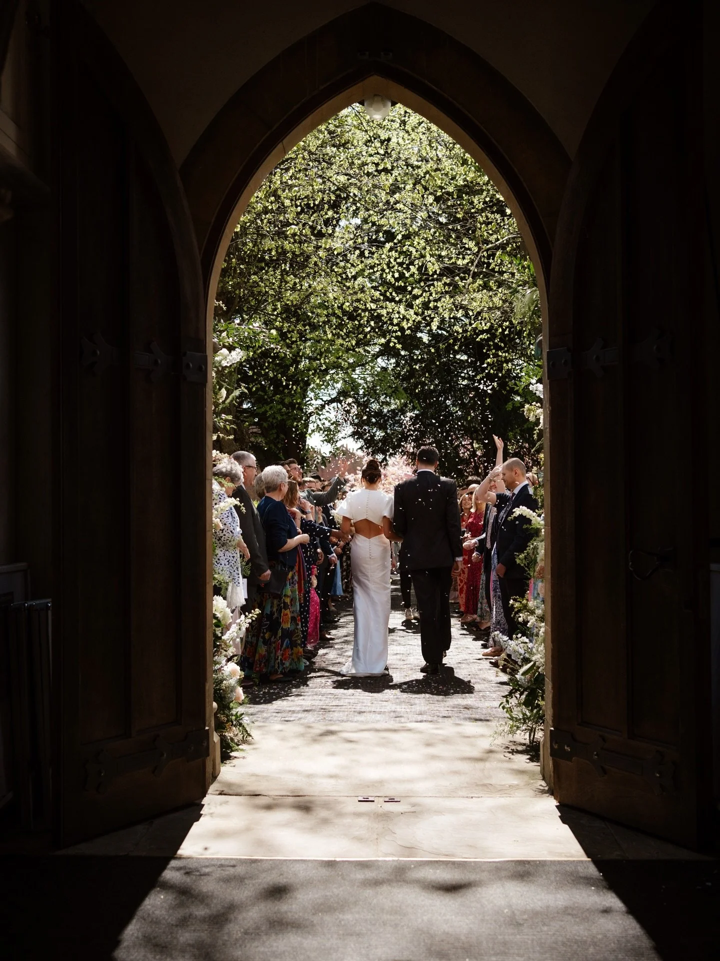 Absolutely LOVE this shot from @davezapleweddings that he captured during a wedding second shooting with @olliebainesphotography.

I asked Dave to capture the confetti from a different angle and he used the frame of the church doors so beautifully! I