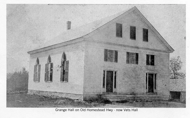 No. 147 Grange Hall, Veterans Memorial Hall, located at 150 Old Homestead Hwy.  Built in 1837, the building has double doors on the front, arch shaped windows on the sides and shutters on the windows. The carriage shed pictured  to the right of the b