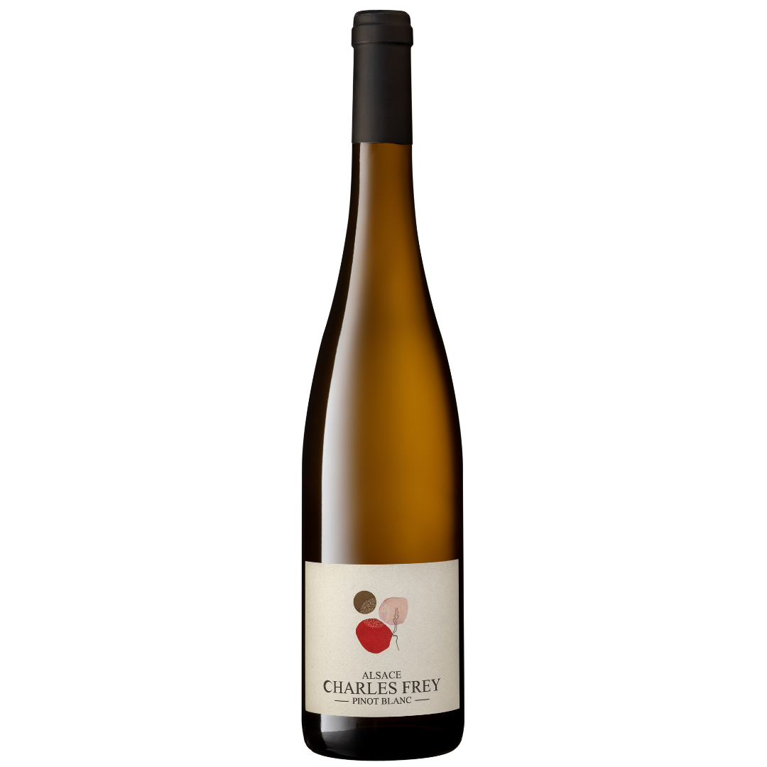Bottle of Alsace Charles Frey Pinot Blanc wine with modern minimalist label featuring abstract shapes in red, pink, beige, and black.