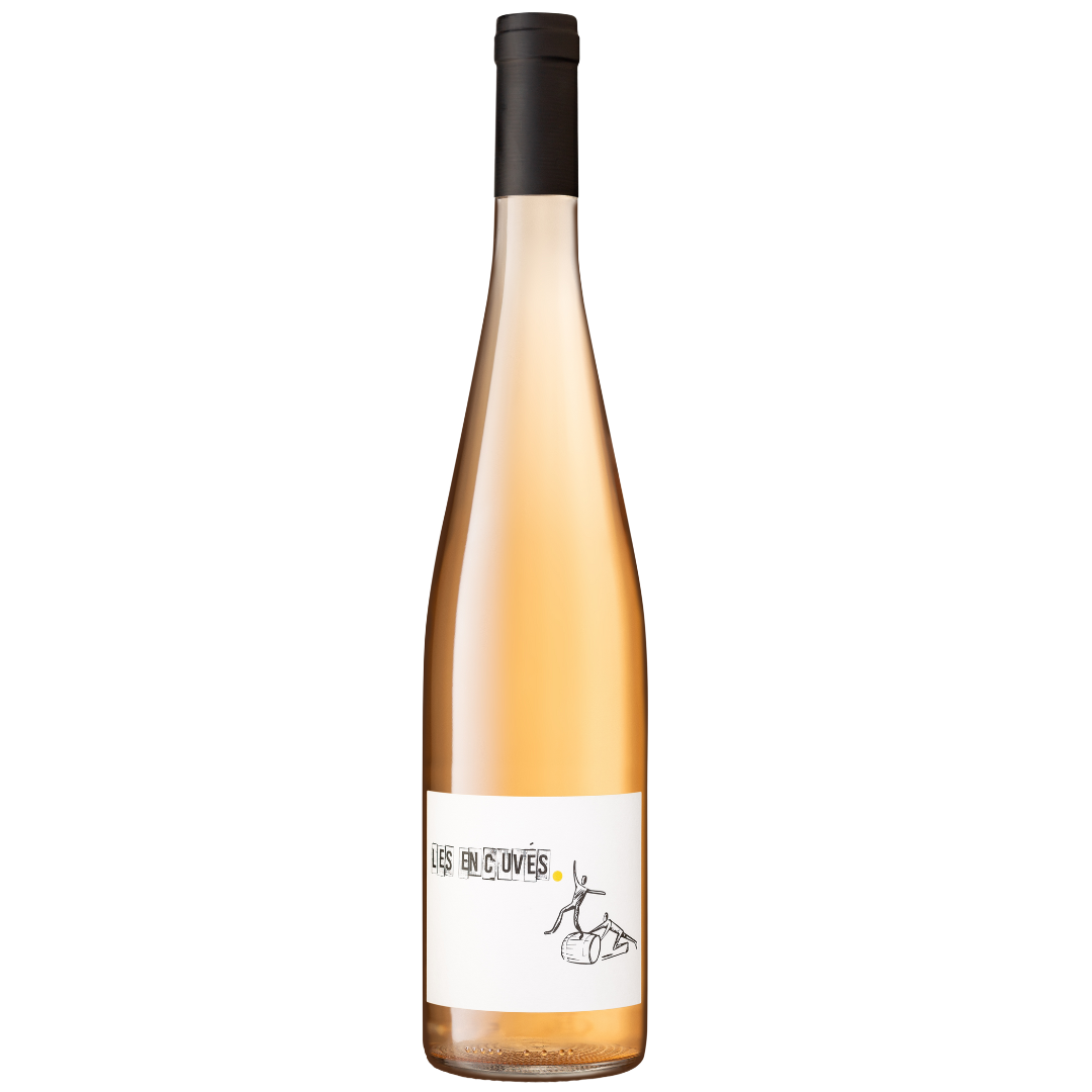 Bottle of rosé wine with a minimalist label featuring a stick figure balancing on a barrel and the text 'Les En Cuvés'.