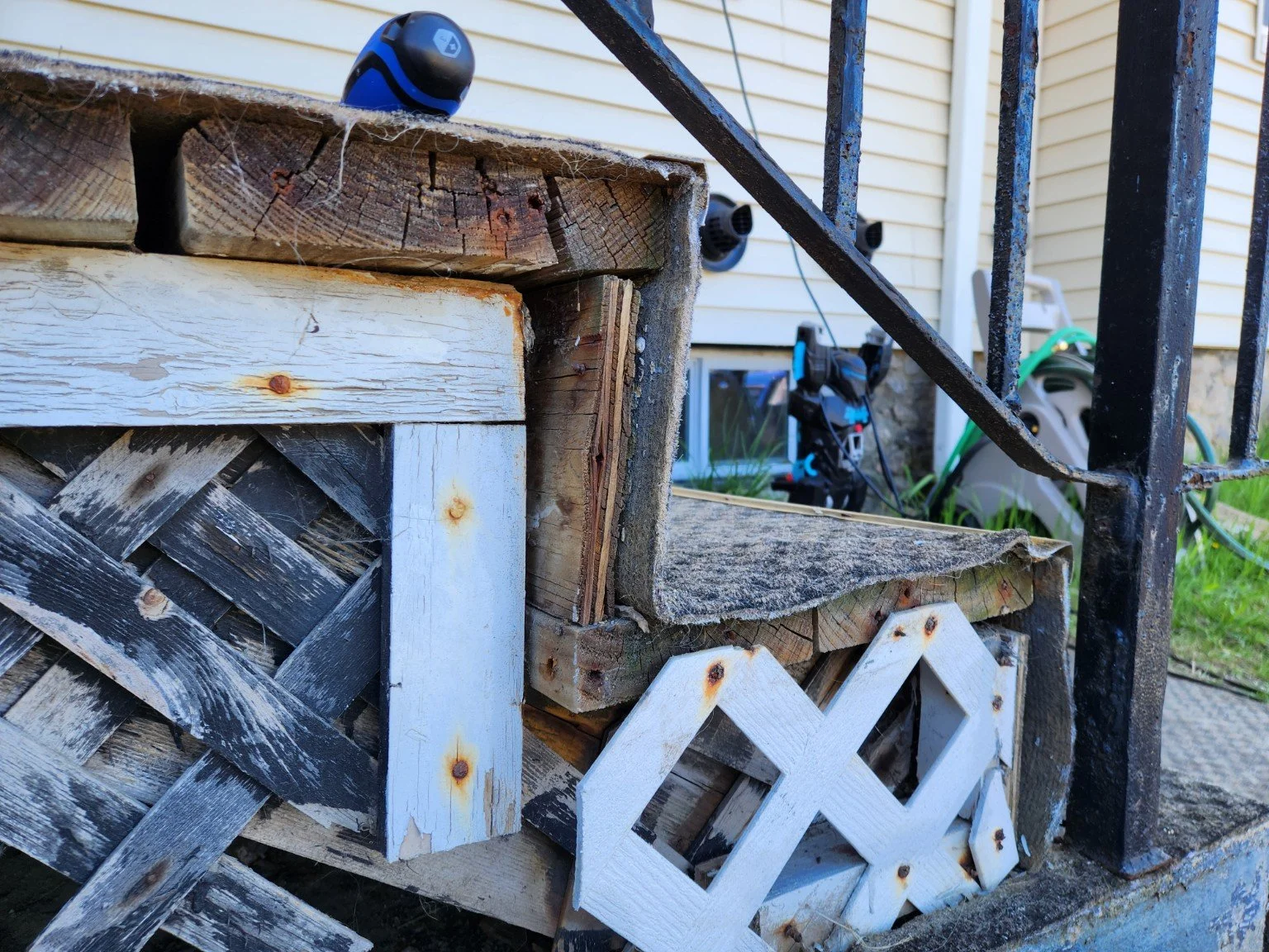 Deteriorated trim and framing components were removed to expose underlying structural conditions.