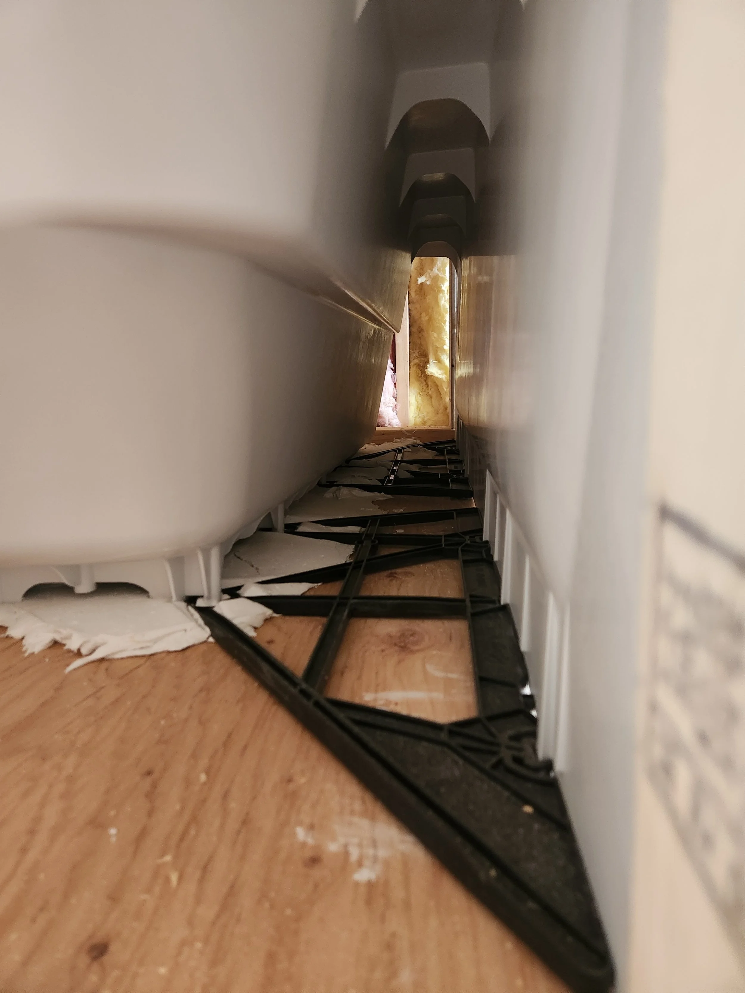 The tub was installed with additional structural reinforcement to prevent movement and long-term warping.