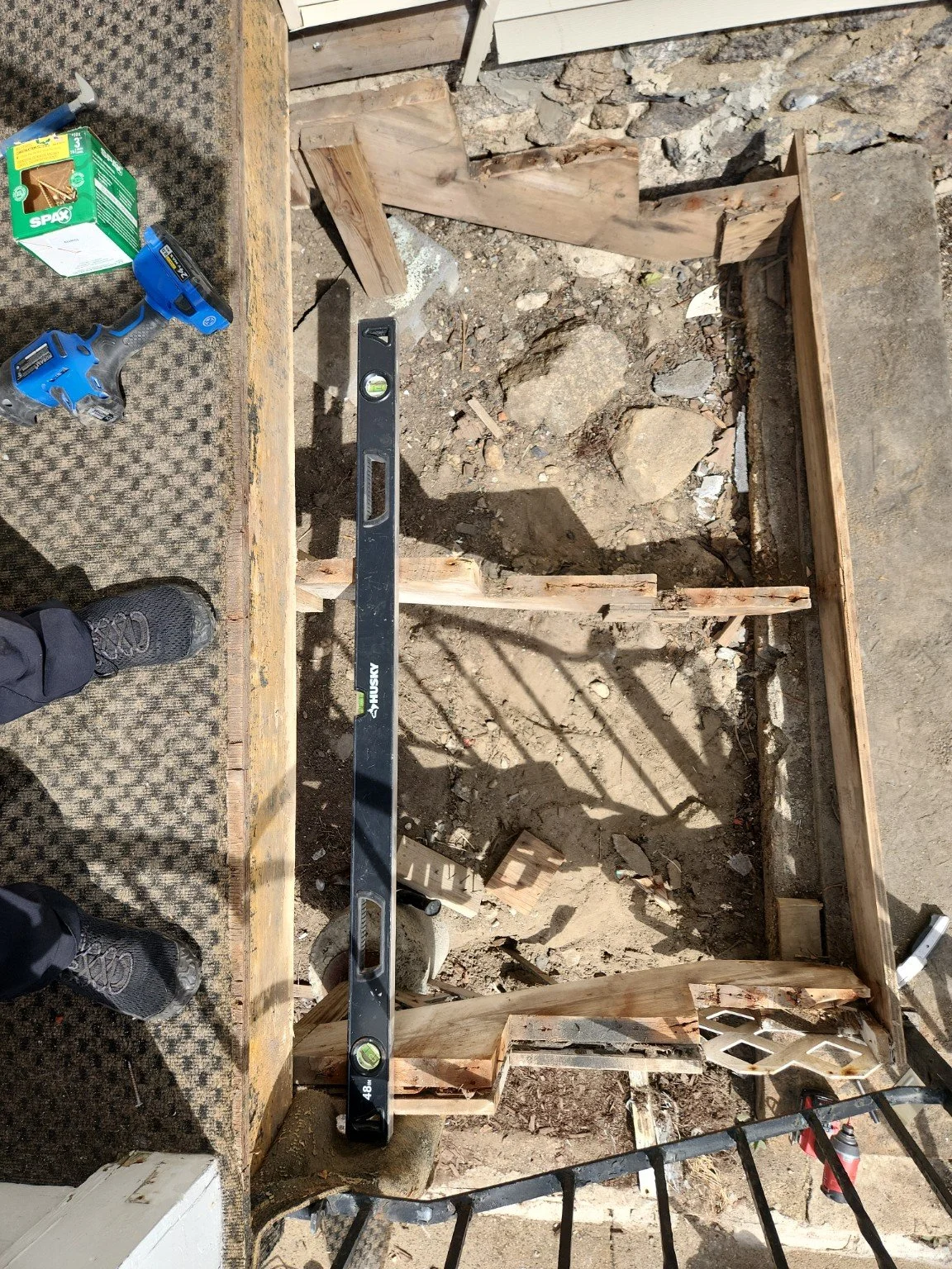 Temporary supports were installed and layout was verified prior to rebuilding the stair structure