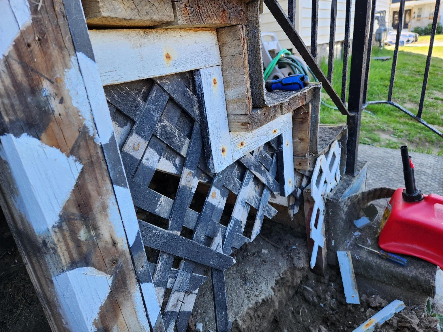 Existing stair framing showed inadequate support and improper load transfer to grade.