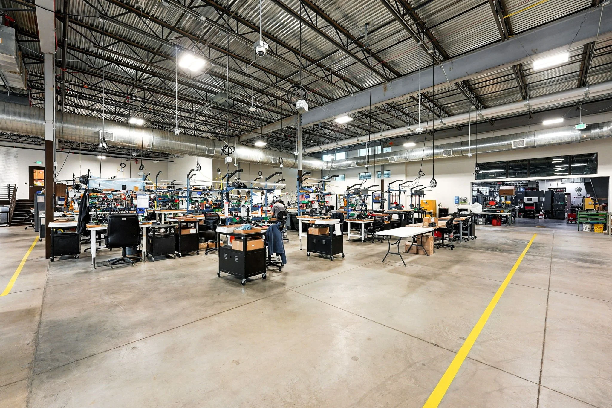 Spyderco: the large open plan allows for more employees and functionally connects the spaces for moving equipment and parts between spaces.