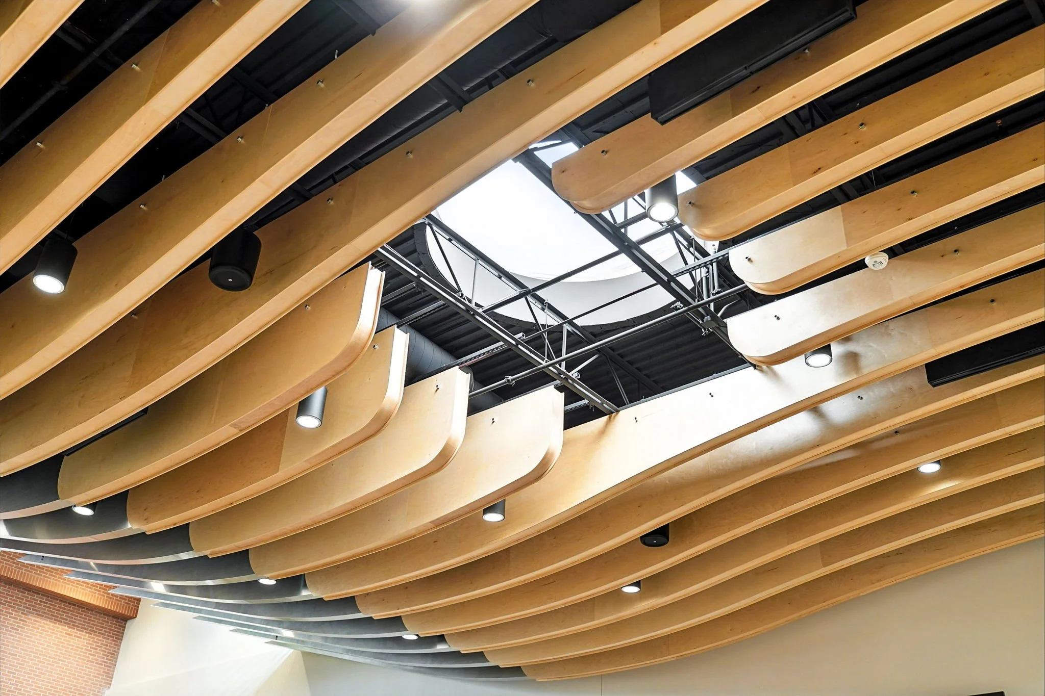 The skylight in the event space brings natural light into the space that is ever changing based on the weather and time of day.