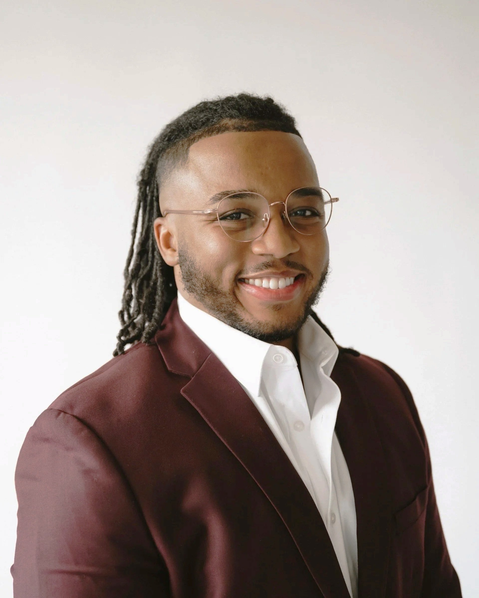 thumbnail_ADAM - HEADSHOT-27.jpg