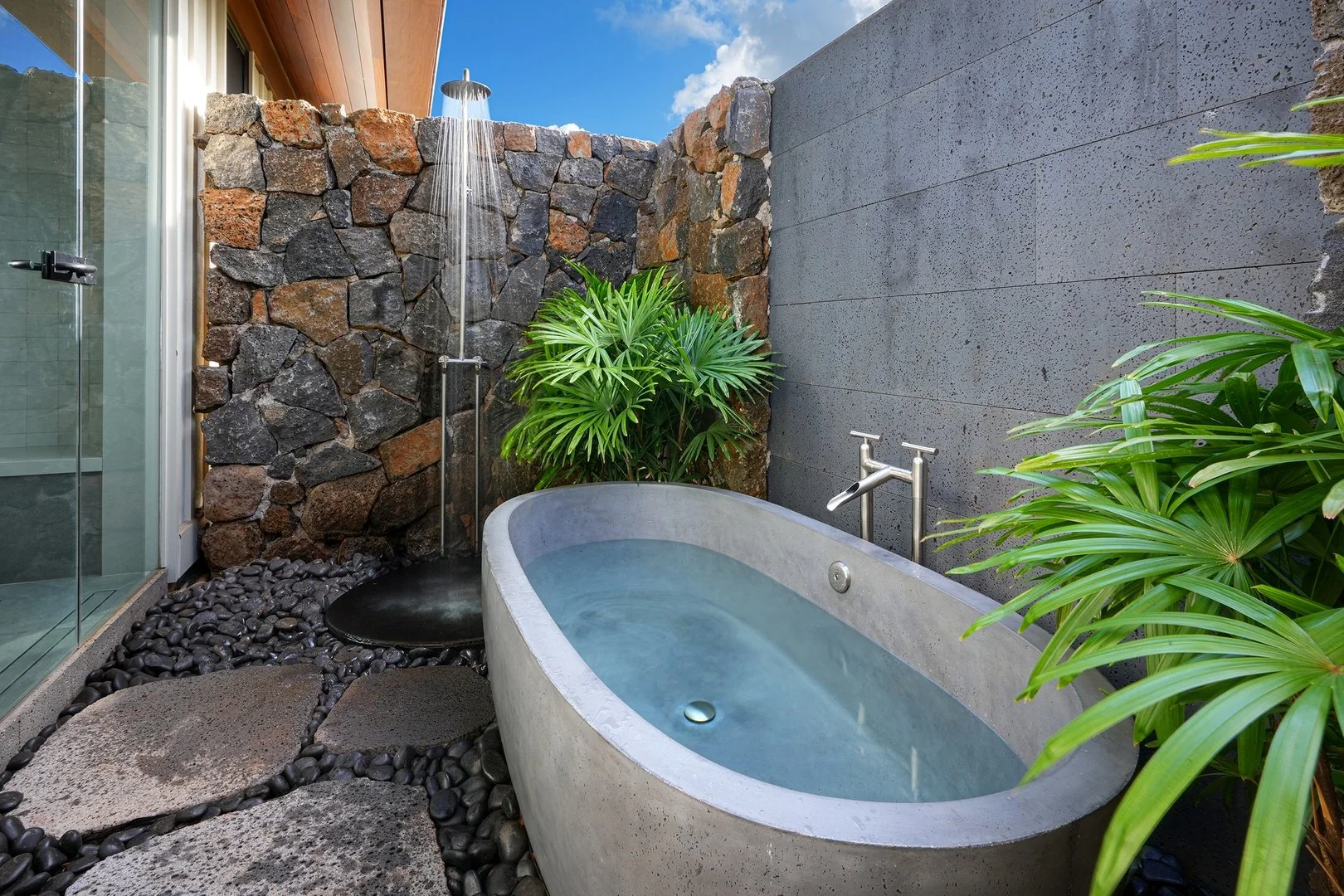 Ivory Cove Interiors - Between Land and Sea - Primary Outdoor Shower and Soaking Tub