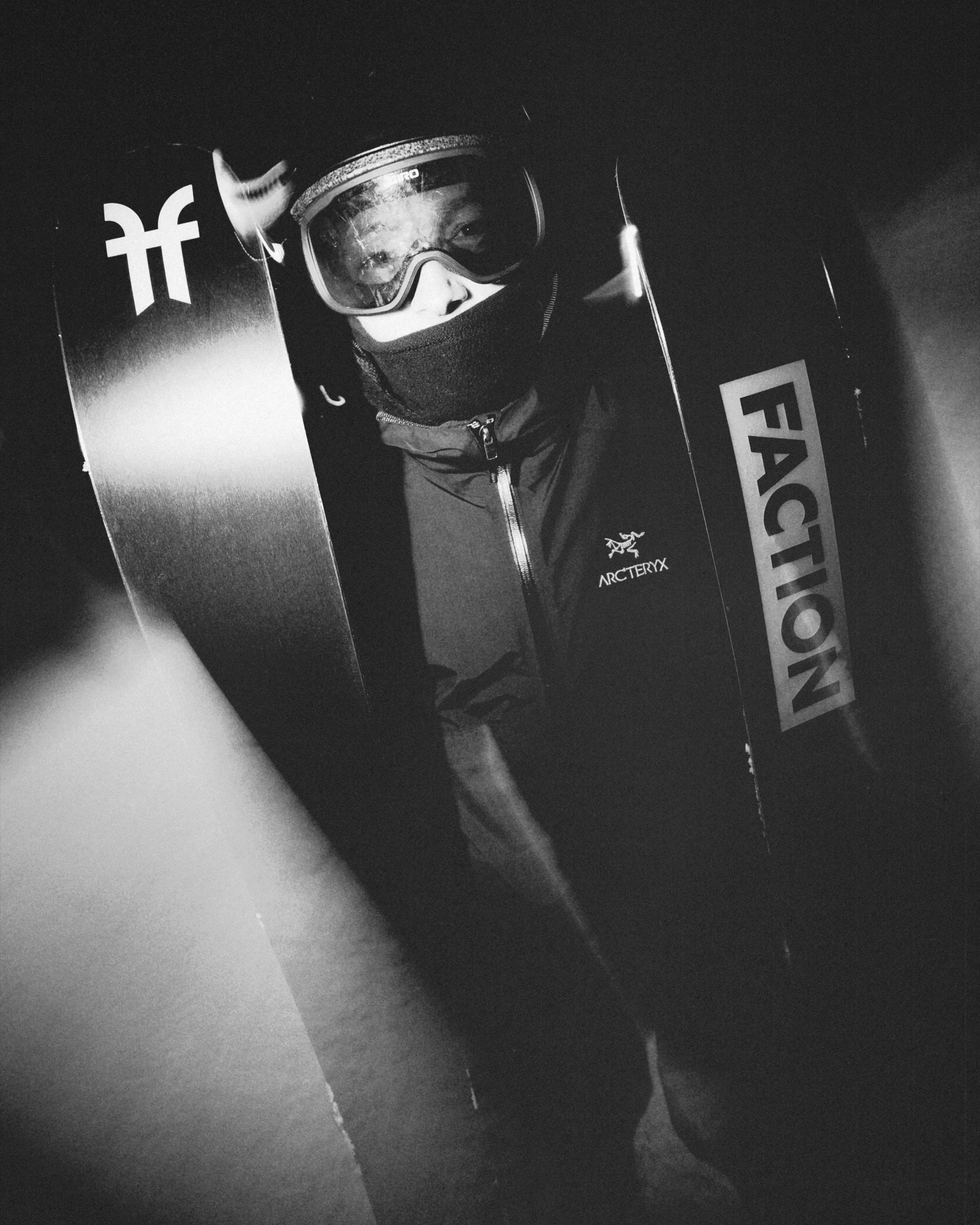 Skier with Faction skis in an Arc'teryx jacket, night skiing in Japan