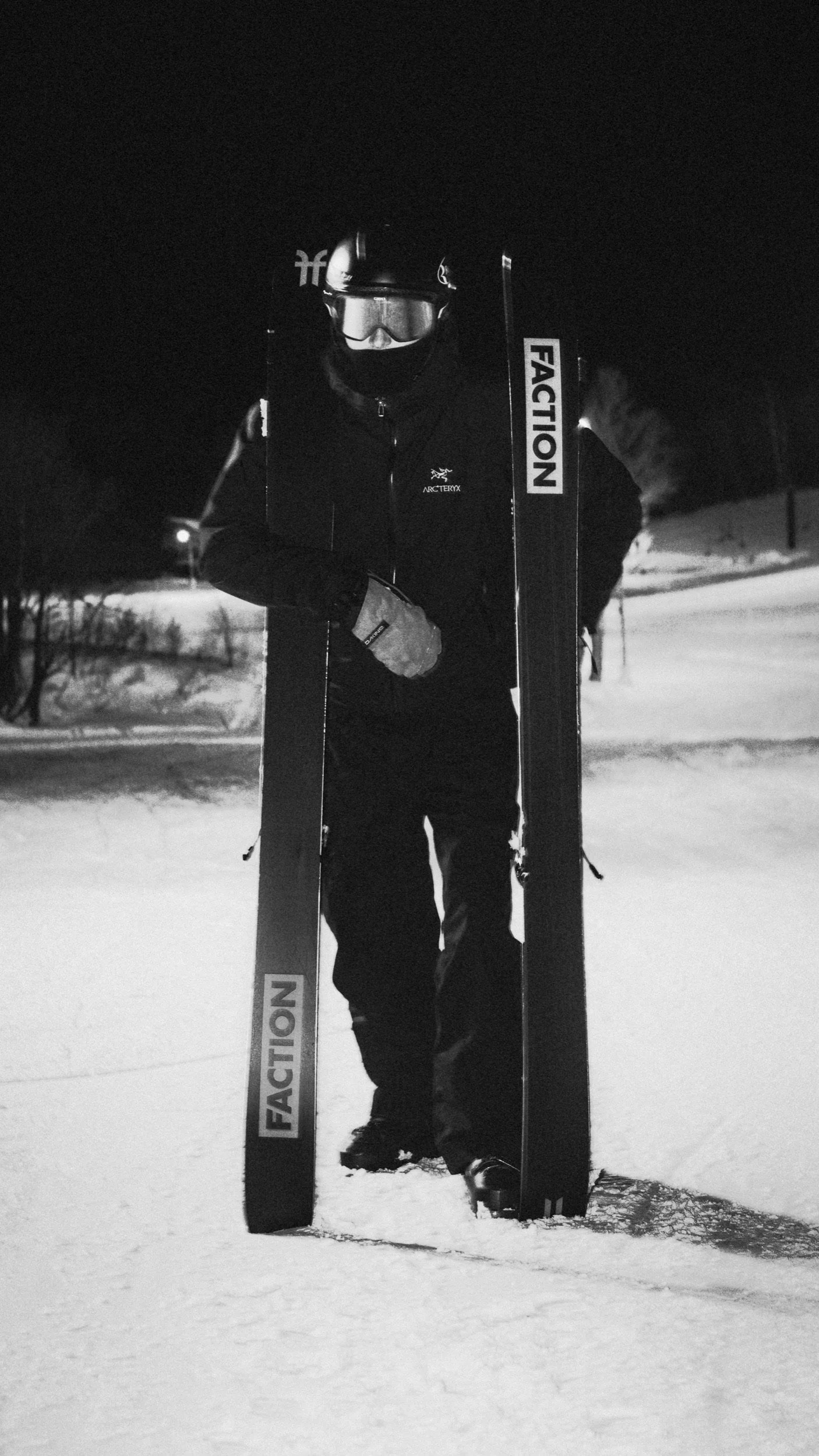 Skier with Faction skis and an Arc'teryx jacket, ready for night skiing in Japan