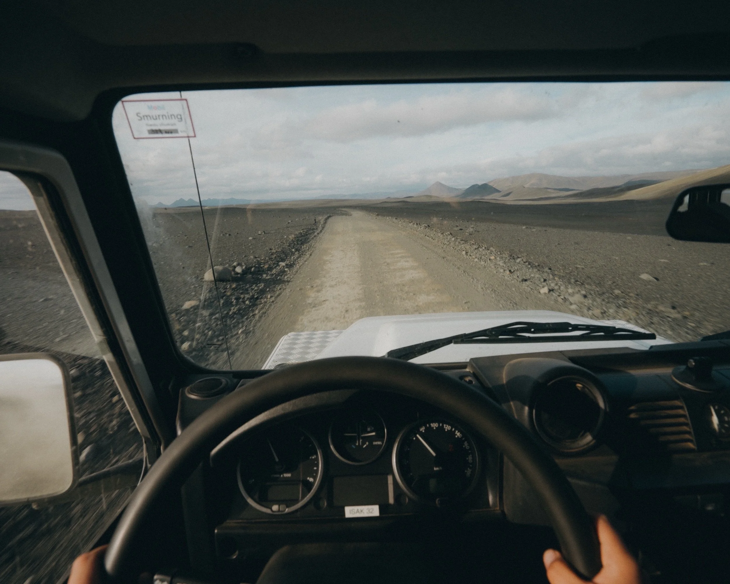 View through the windshield of a Land Rover Defender on a Highland track (F-road), Iceland