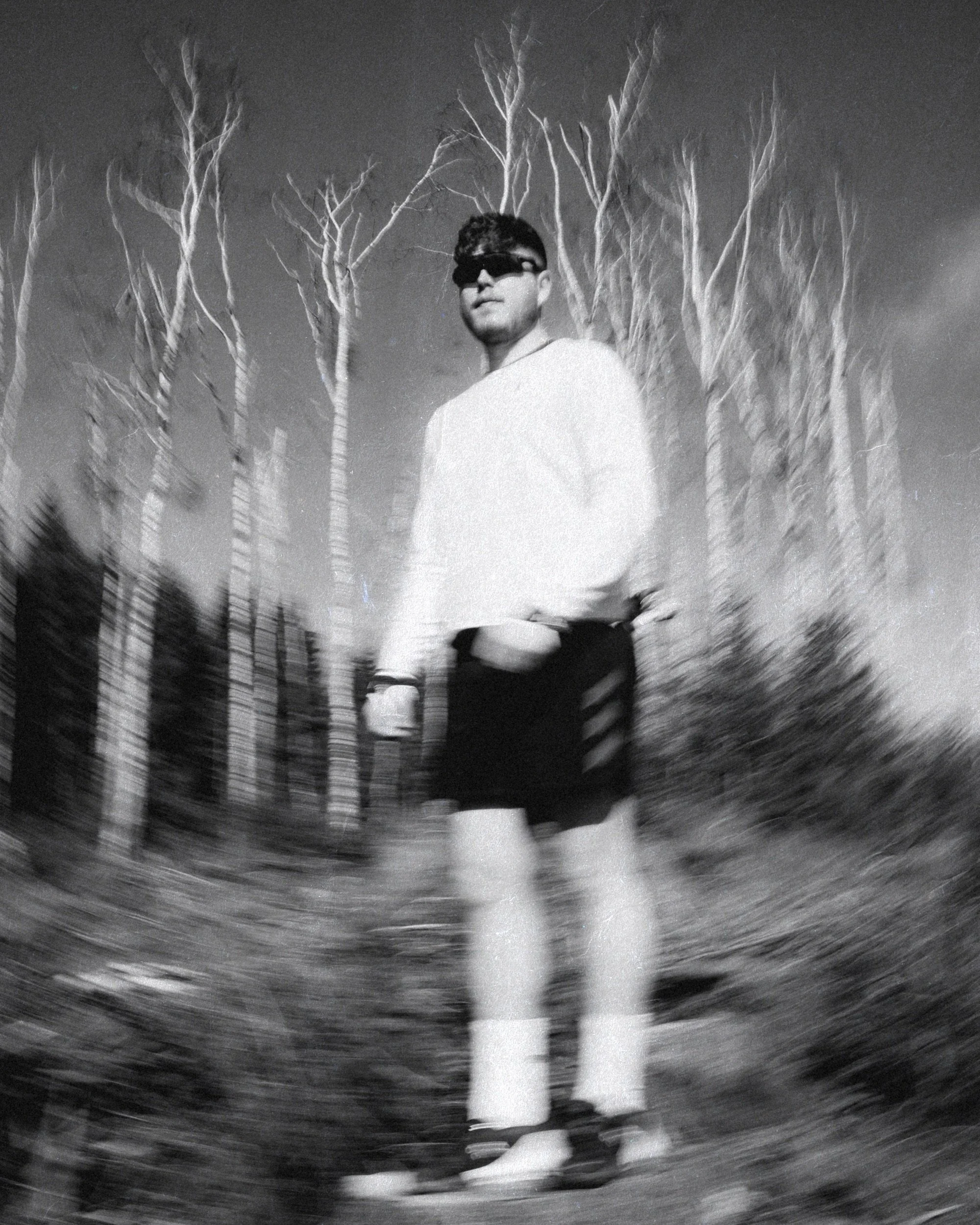 Trail runner in Adidas Terrex and Oakley, black and white slow-shutter shot in the forest, Thuringian Forest, Germany