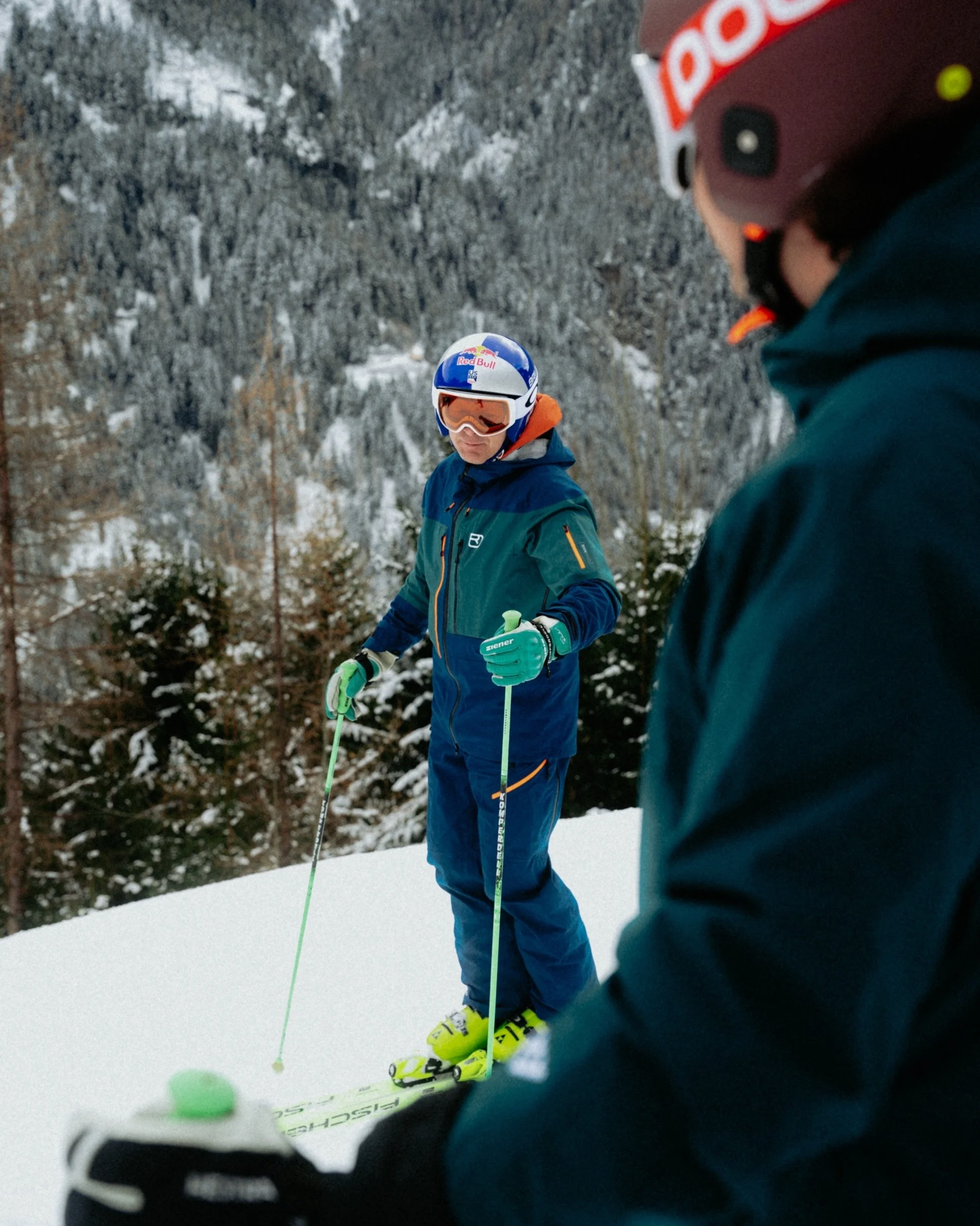 Two skiers getting ready in a snowy forest in Kappl, Austria