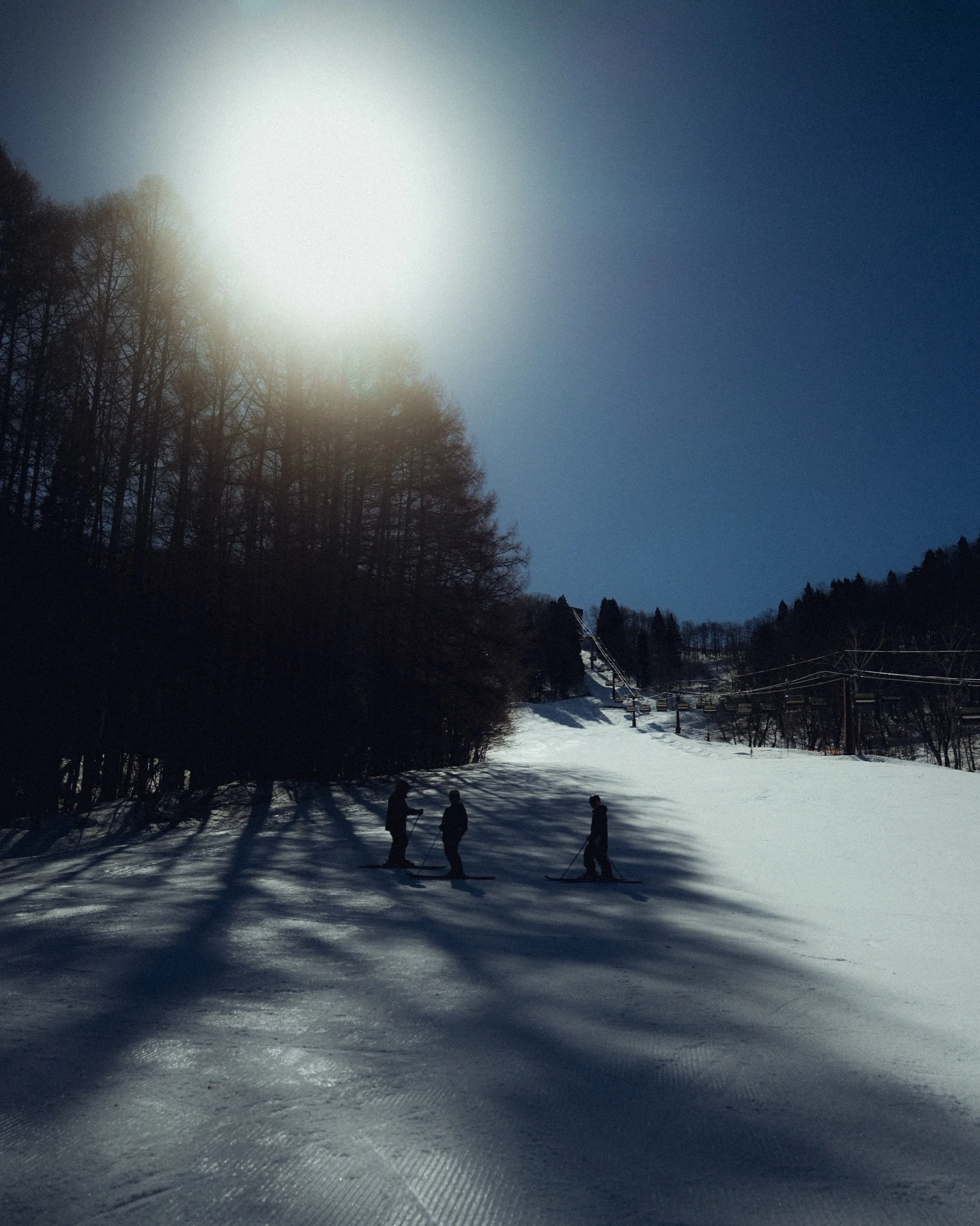 Ski instructors on the slope at Tangram Madarao, Japan