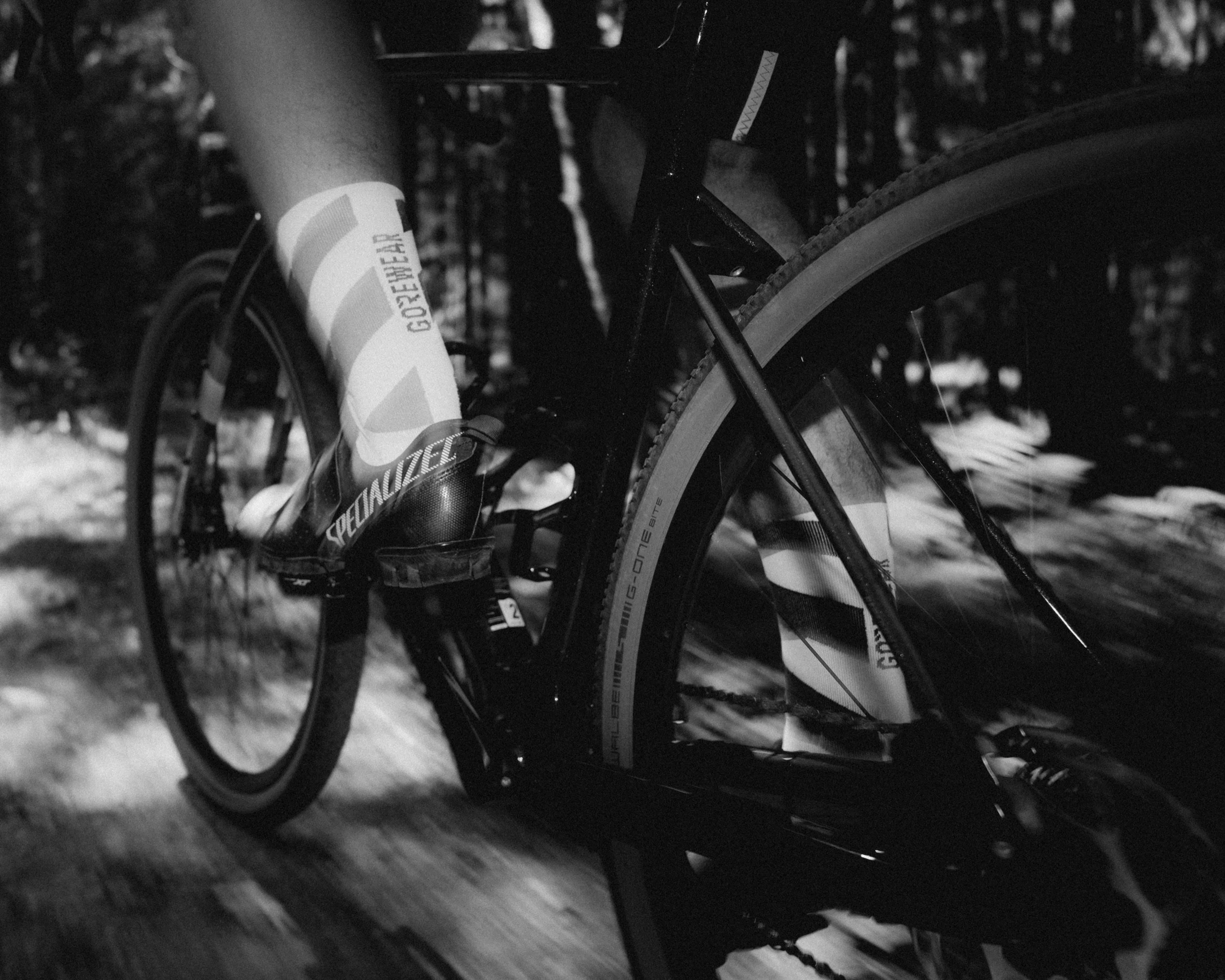Specialized gravel shoes and Gore Wear socks on a gravel ride, flash photography in the Thuringian Forest, Germany