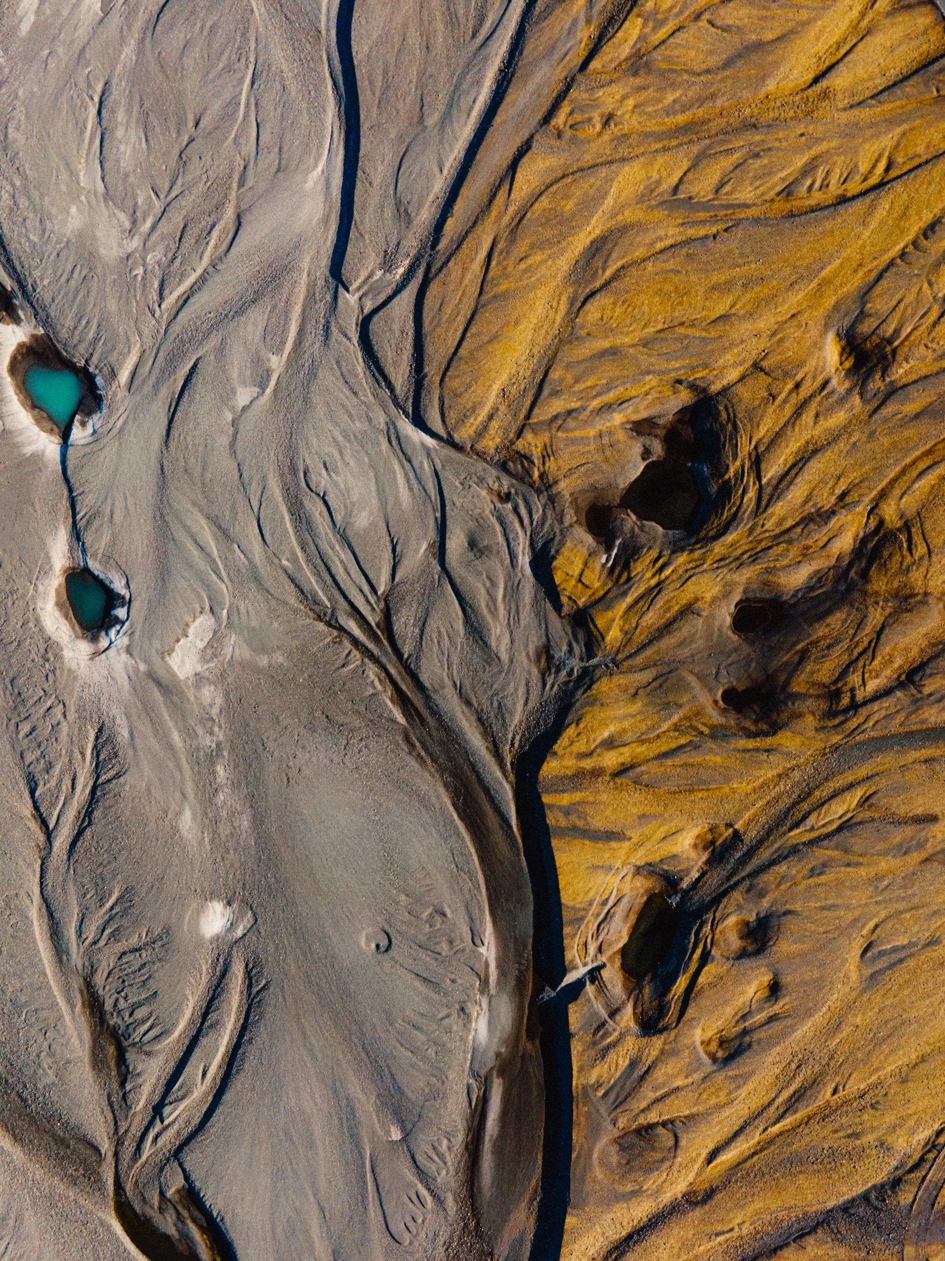Aerial view of eroded volcanic landscape with dry riverbeds, Icelandic Highlands