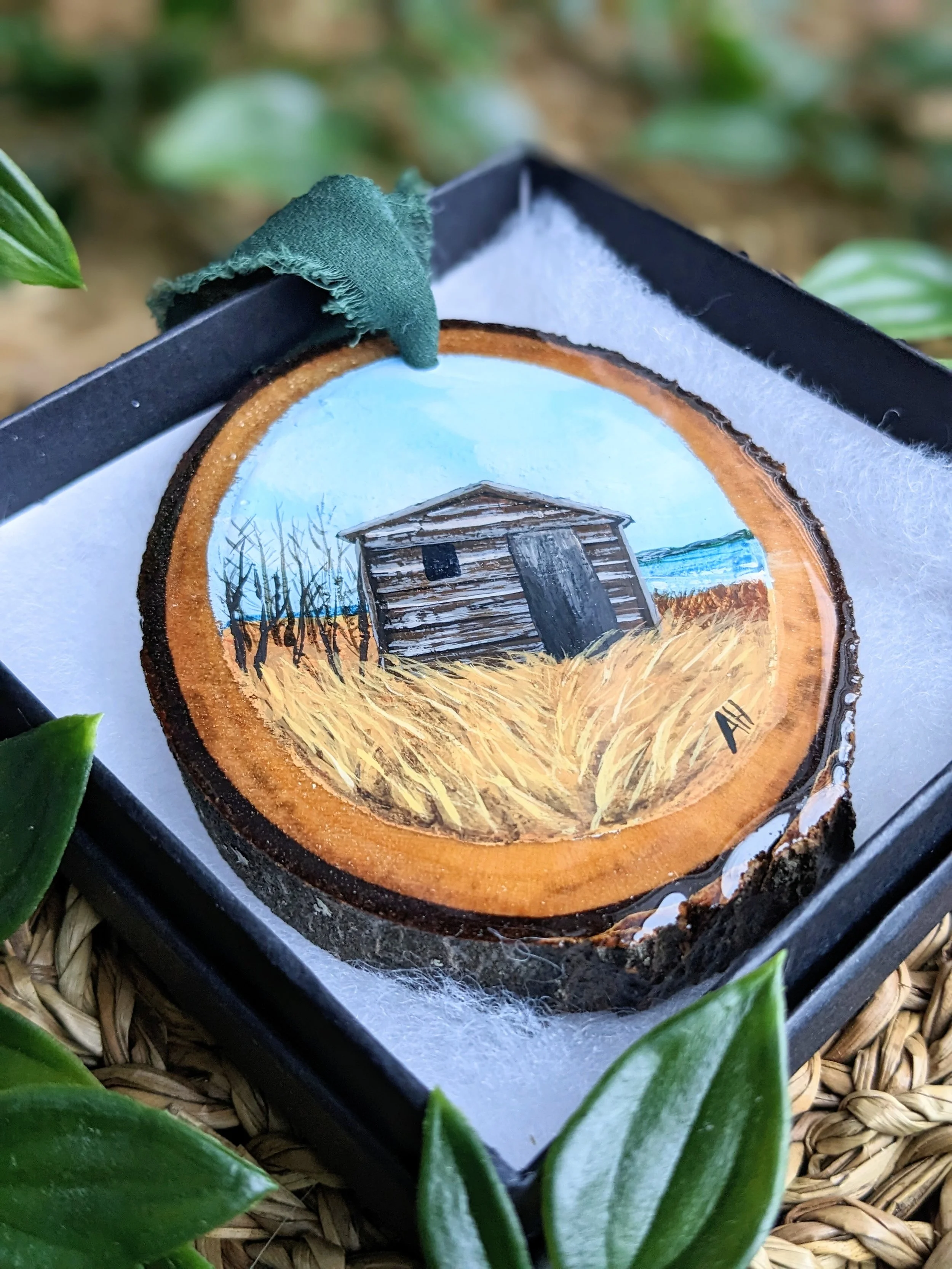 Custom hand-painted Christmas ornament featuring a woodshed (2023)