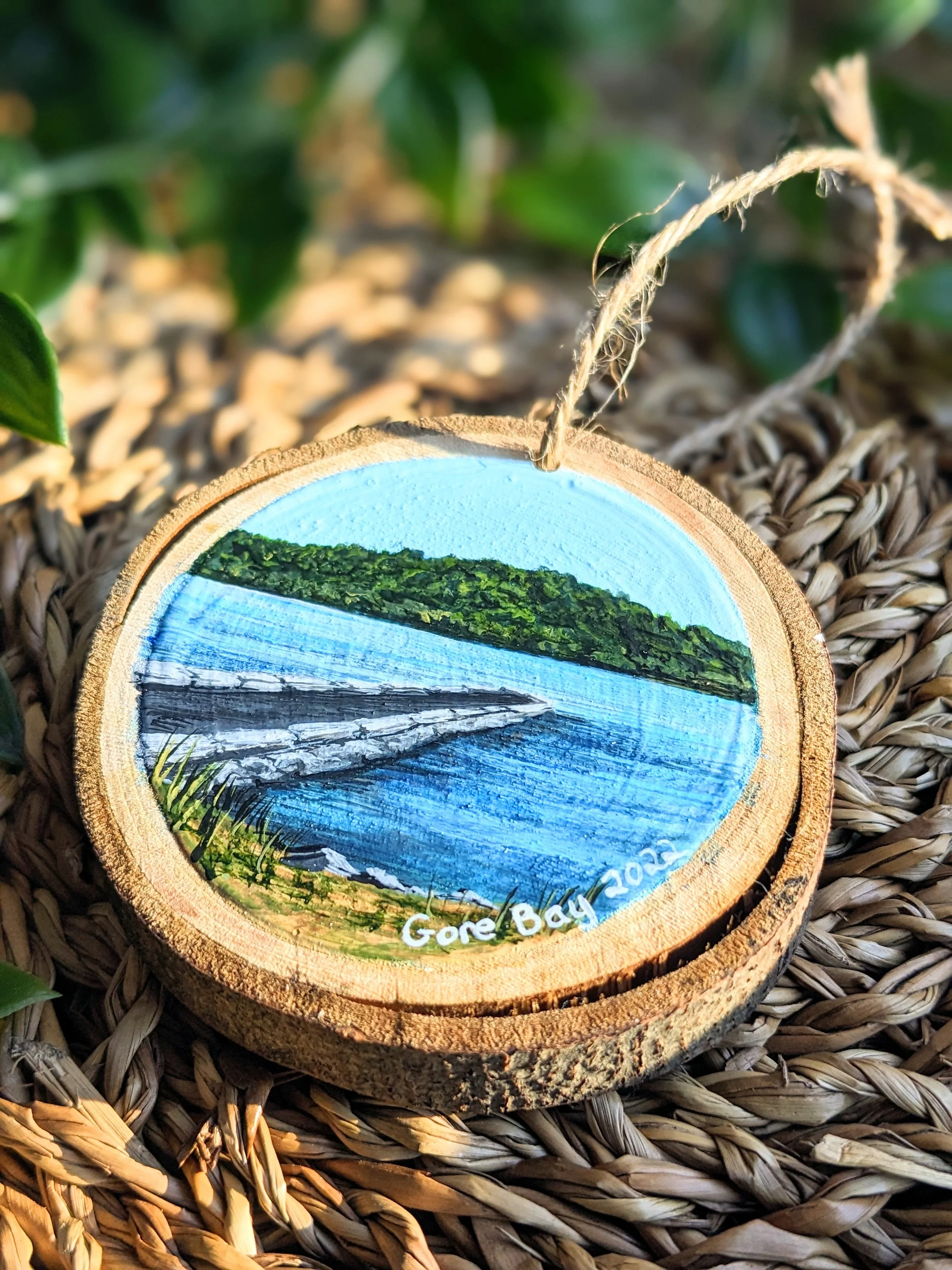 Custom hand-painted Christmas ornament featuring a pier in Gore Bay Manitoulin Island (2022)