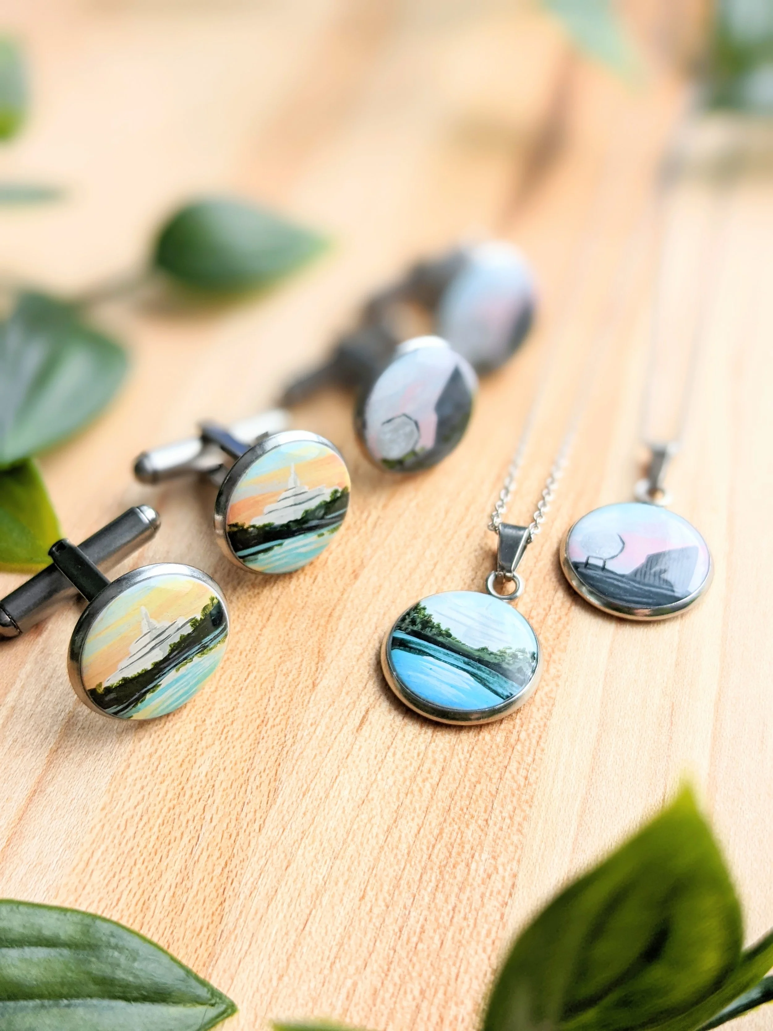 Custom hand-painted cufflinks and necklaces featuring Science North and Dynamic Earth and the Big Nickel (2022)