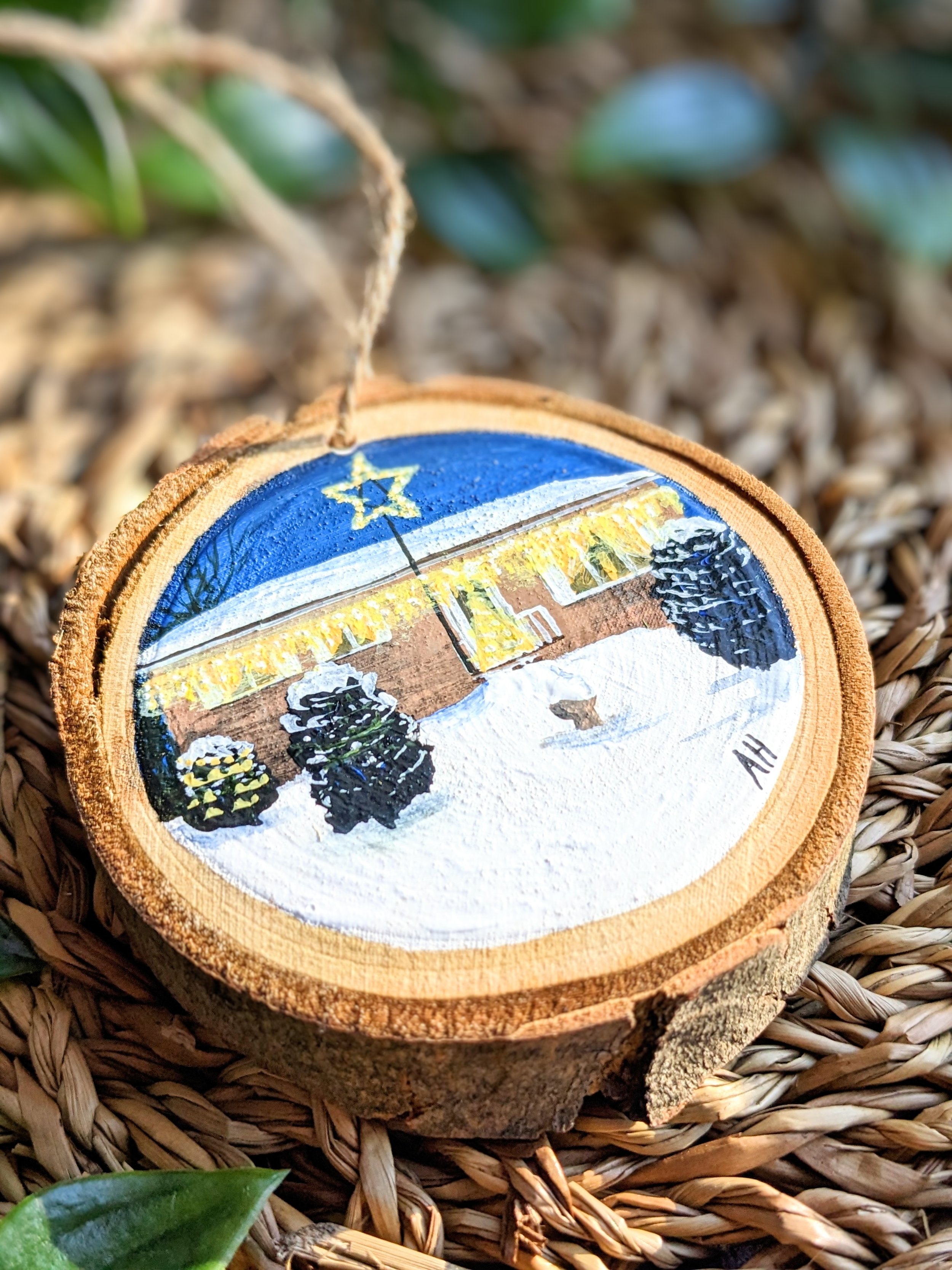 Custom hand-painted Christmas ornament of a house adorned in Christmas decorations (2022)
