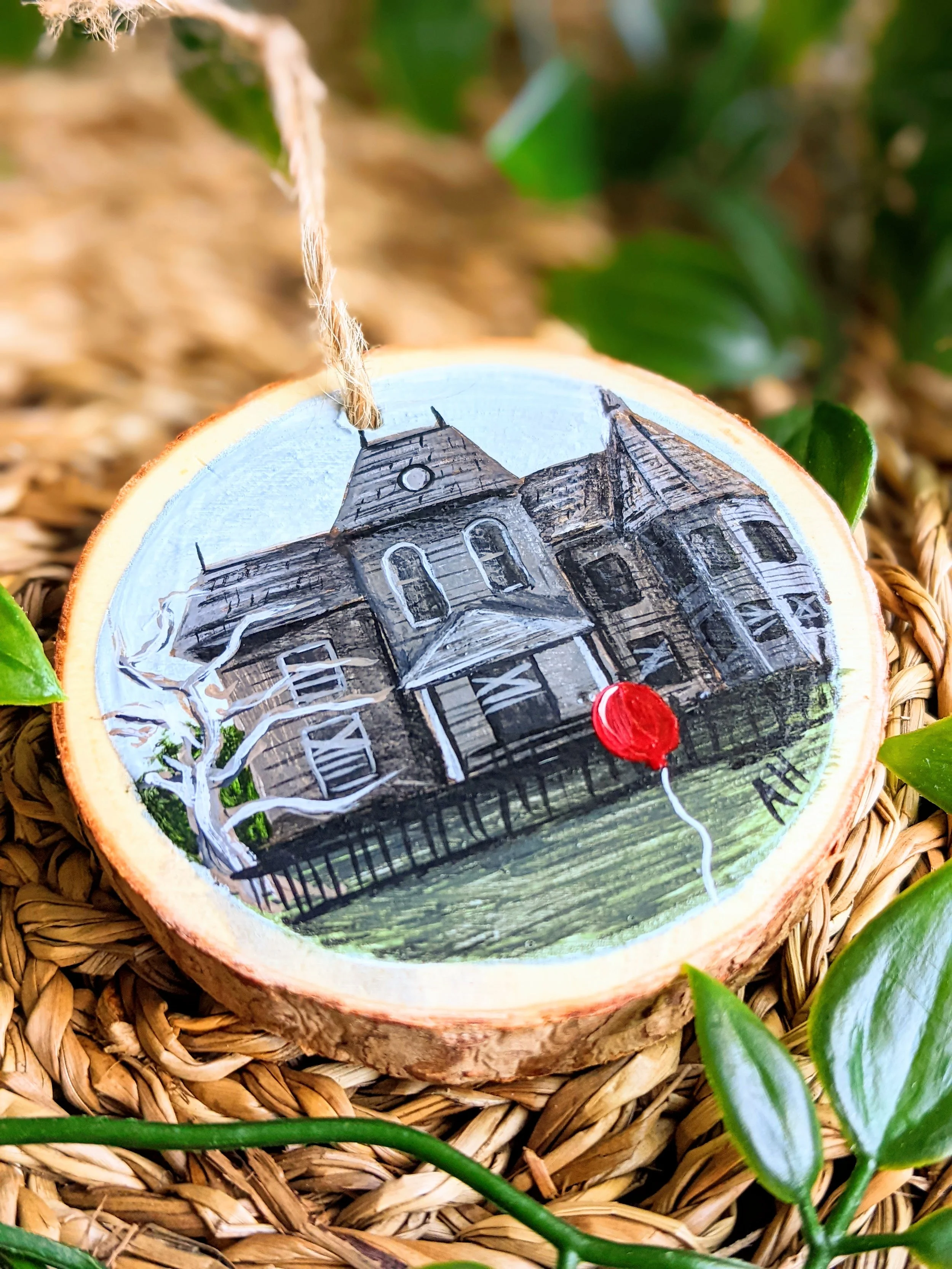 Custom hand-painted Christmas ornament featuring a horror movie house (2022)