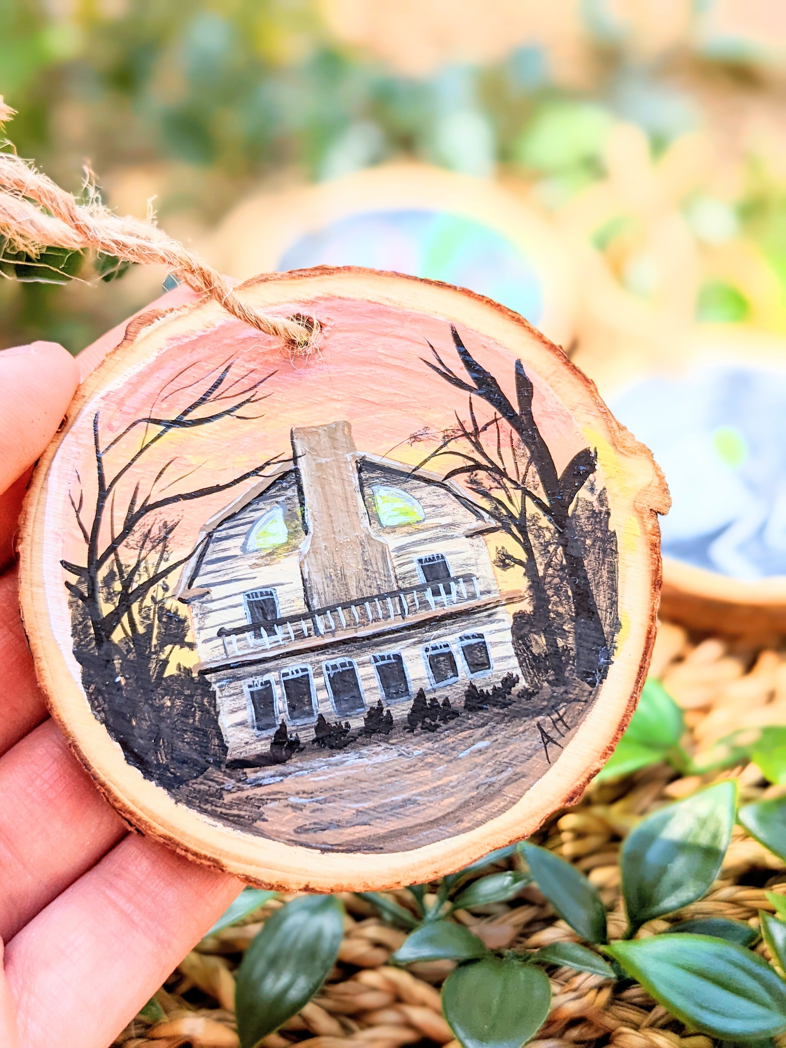 Custom hand-painted Christmas ornament featuring a horror movie house (2022)