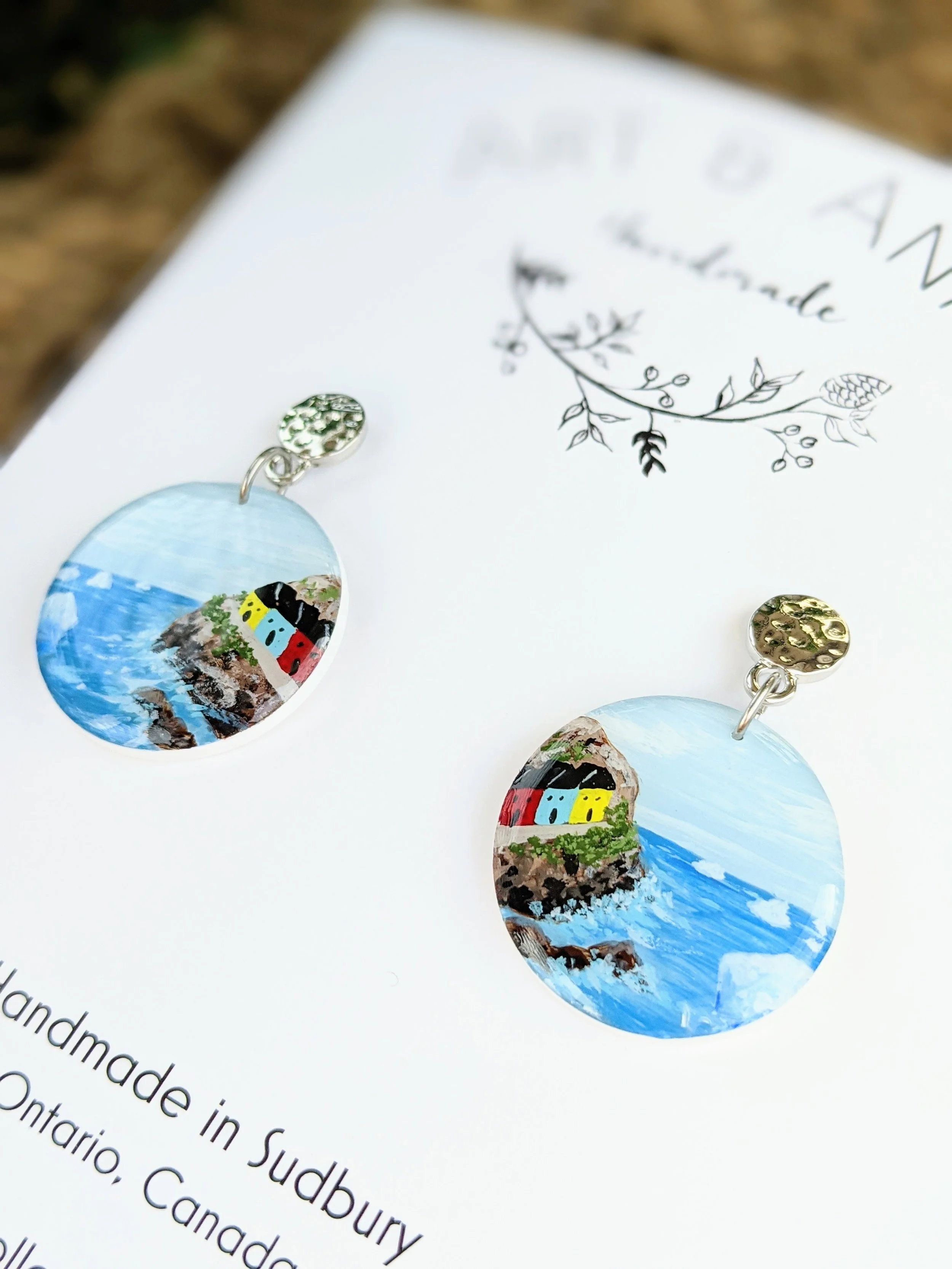 Custom hand-painted earrings featuring Newfoundland and Laborador (2021)