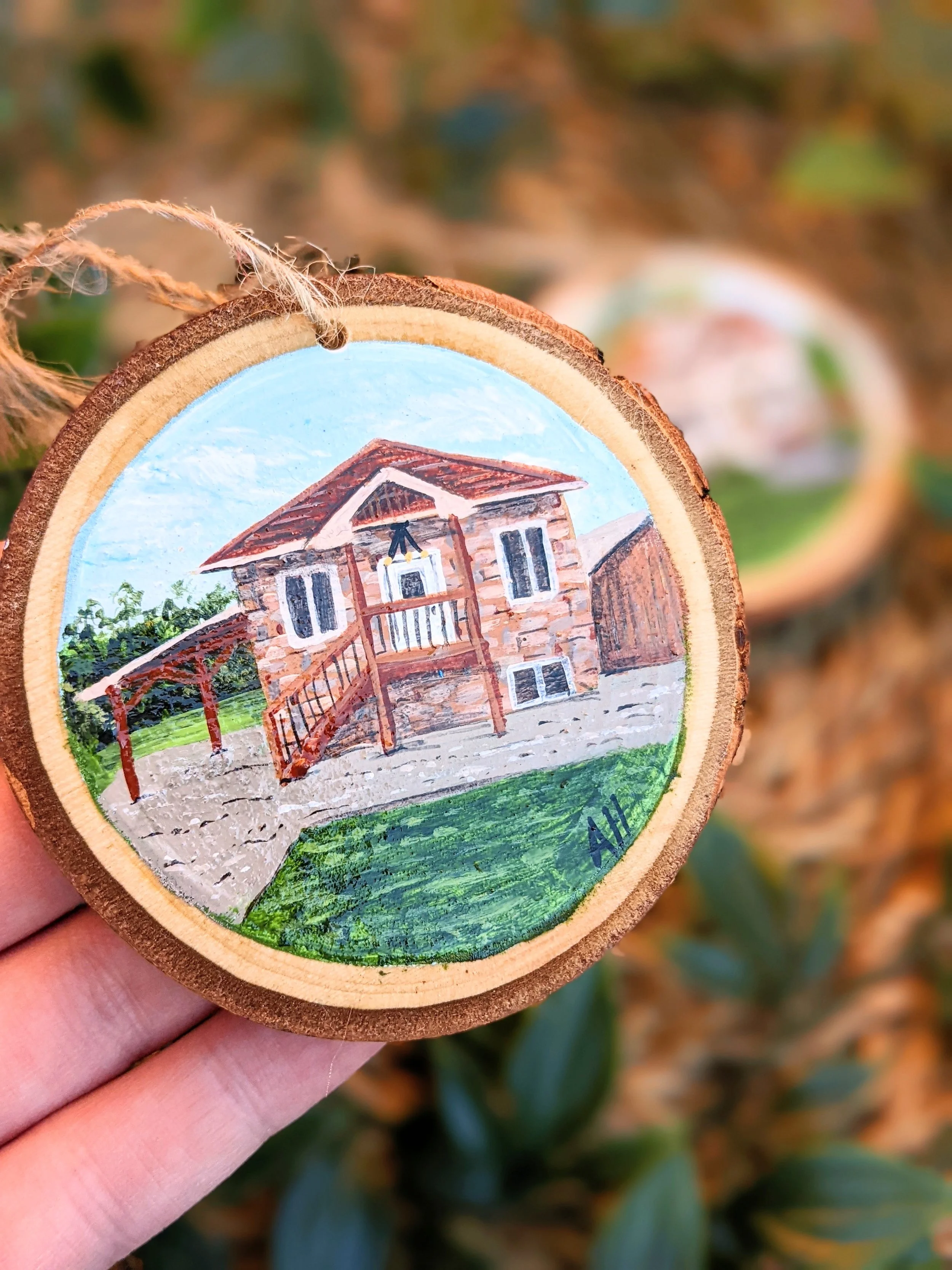 Custom hand-painted Christmas ornament featuring a house (2022)