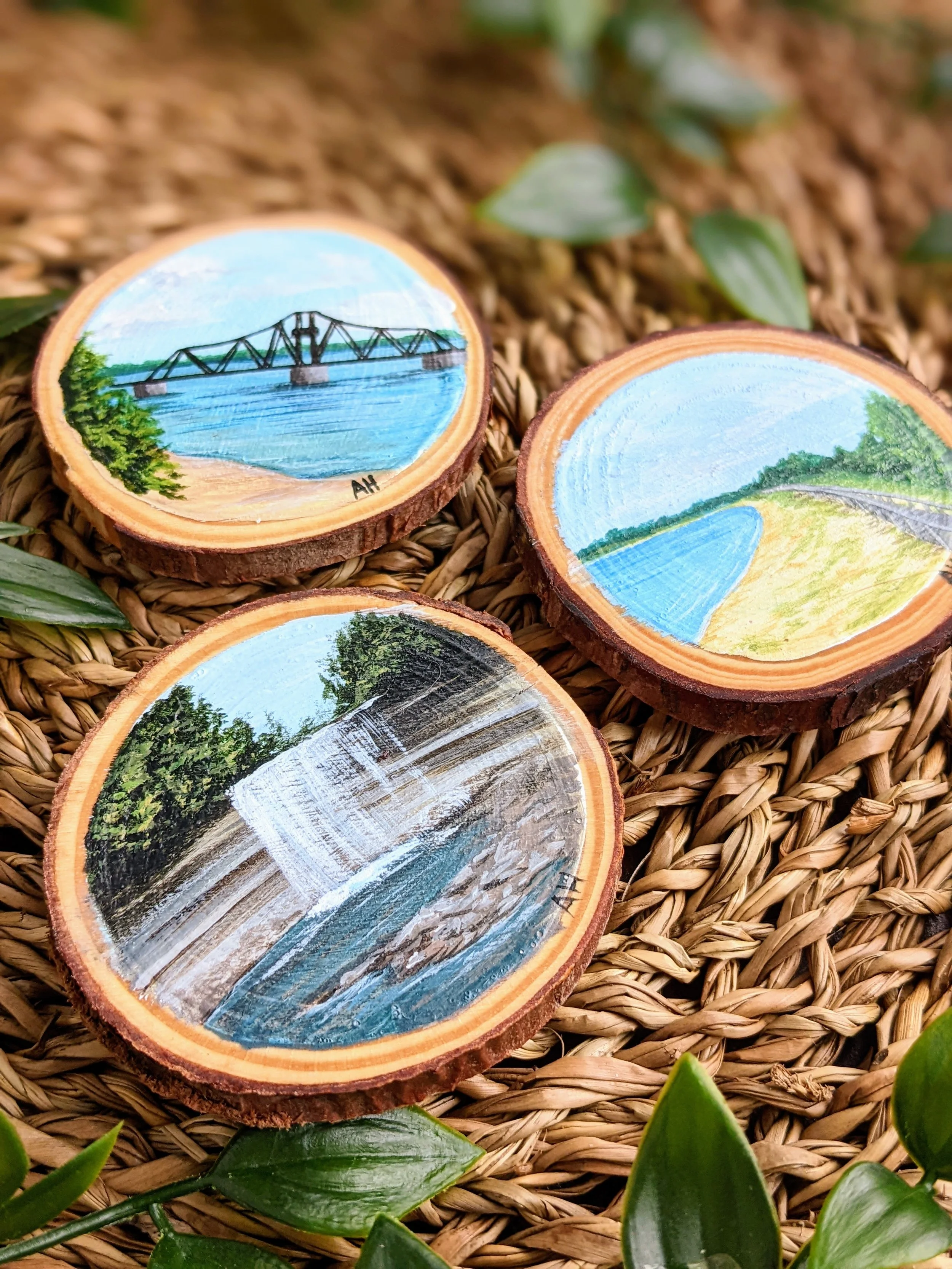 Three custom hand-painted magnets featuring Manitoulin Island landmarks, including the Little Current Swing Bridge, Providence Bay, and Bridal Veil Falls (2022)