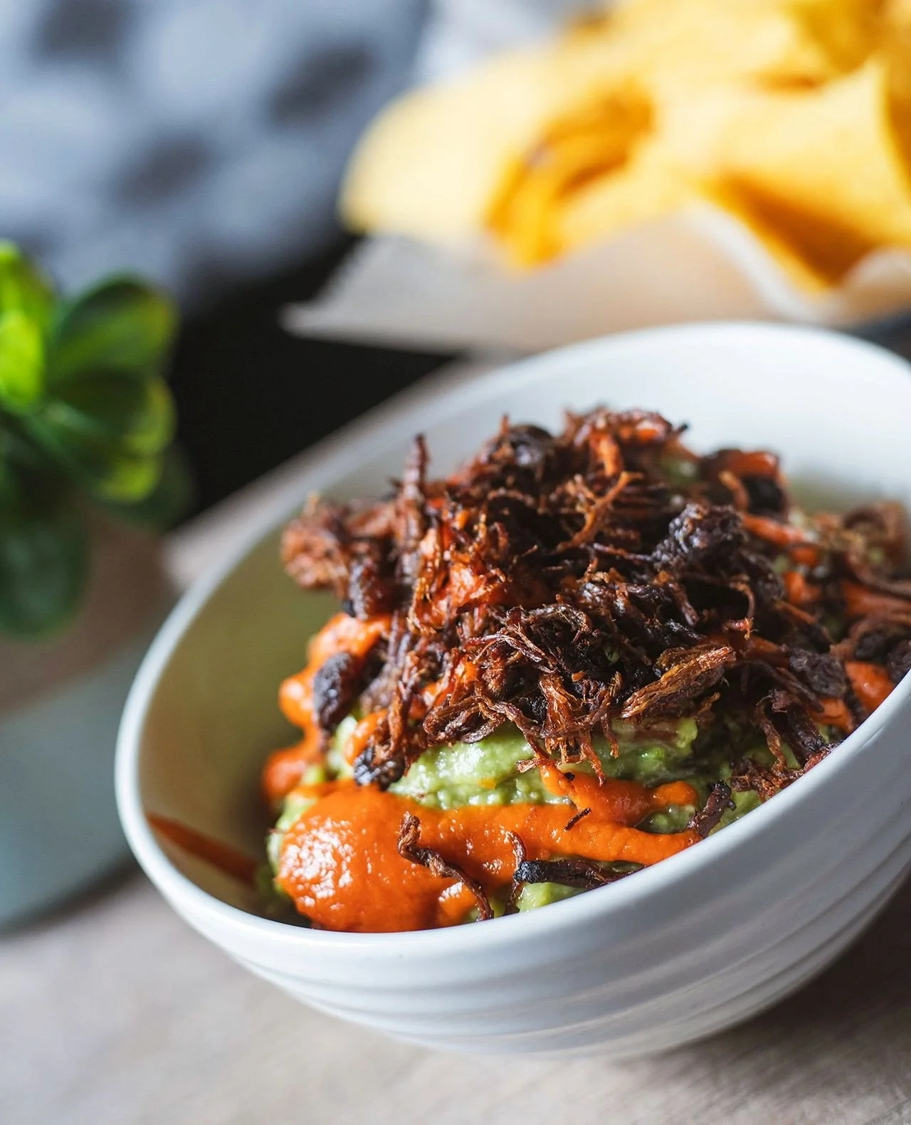 Our Chef's Guac is not here to behave&mdash;crispy brisket, pops of sweetness from raisins, and a rich sun-dried tomato drizzle that brings it all home.⁠
⁠
Sweet, savory, crispy, creamy&hellip; yeah, it&rsquo;s a whole thing.⁠
⁠
Grab your crew and di