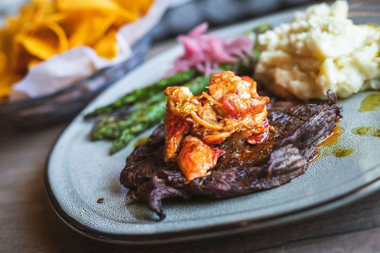 This weekend at Mezcal, we&rsquo;re turning things up 🔥⁠
⁠
Dig into our Poke Tacos &mdash; raw tuna, arugula, fresh pineapple, and wasabi aioli &mdash; or go big with the Surf &amp; Turf featuring grilled bavette steak, lobster with chipotle butter,