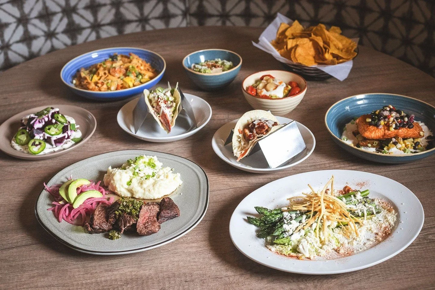 New apps, new salad, new guac, new tacos, new entr&eacute;es. If you're looking a reason to visit Mezcal again, here are a few of them:⁠
⁠
RICOTTA TOMATO PIE GUACAMOLE⁠
spicy roasted cherry tomatoes, roasted garlic whipped ricotta, garlic confit, jal