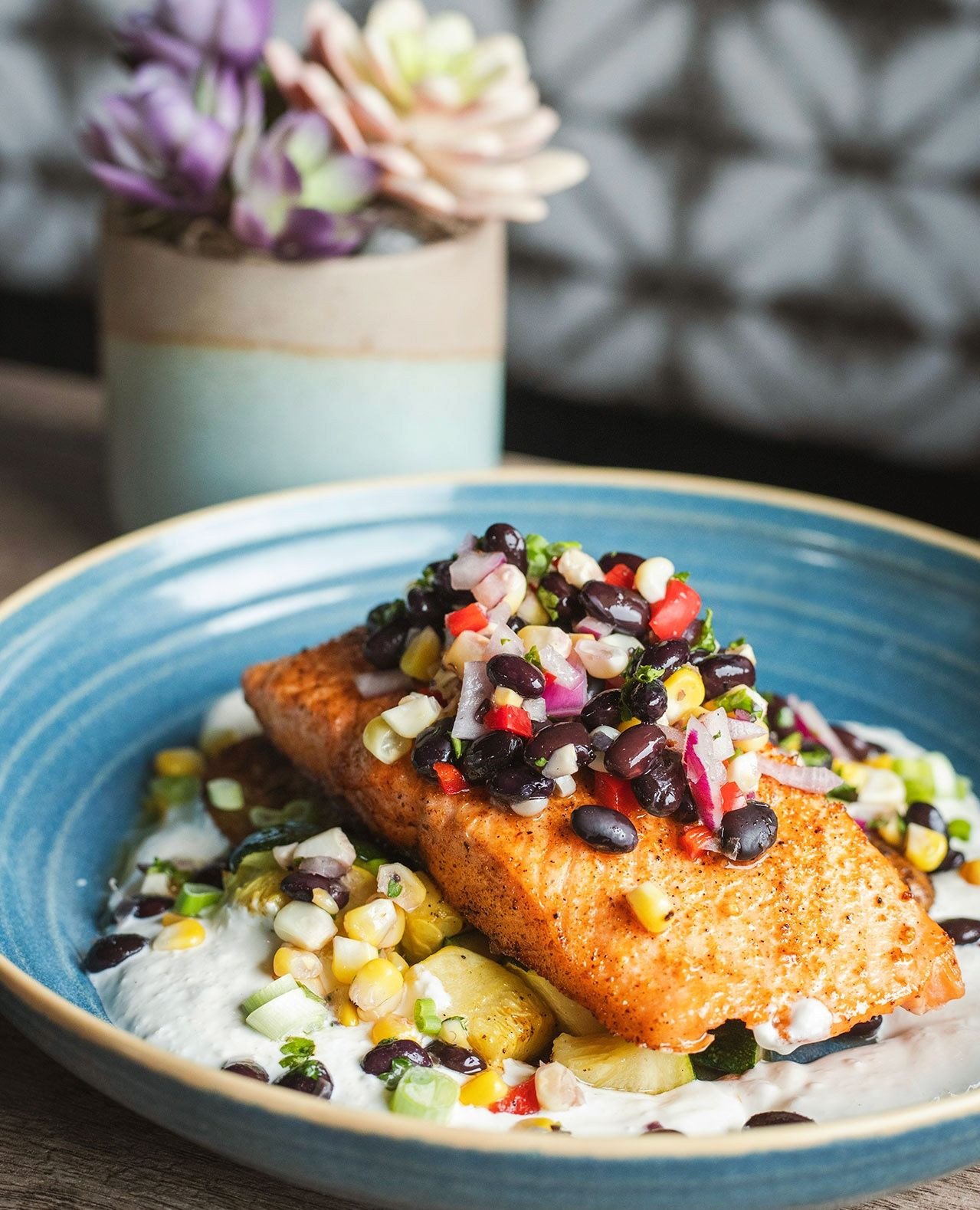 This week in "More than Tacos" we're featuring our Seared Salmon that pairs a perfectly cooked fillet with roasted fingerlings and summer squash, finished with horseradish cream and a grilled corn &amp; black bean vinaigrette that brings br