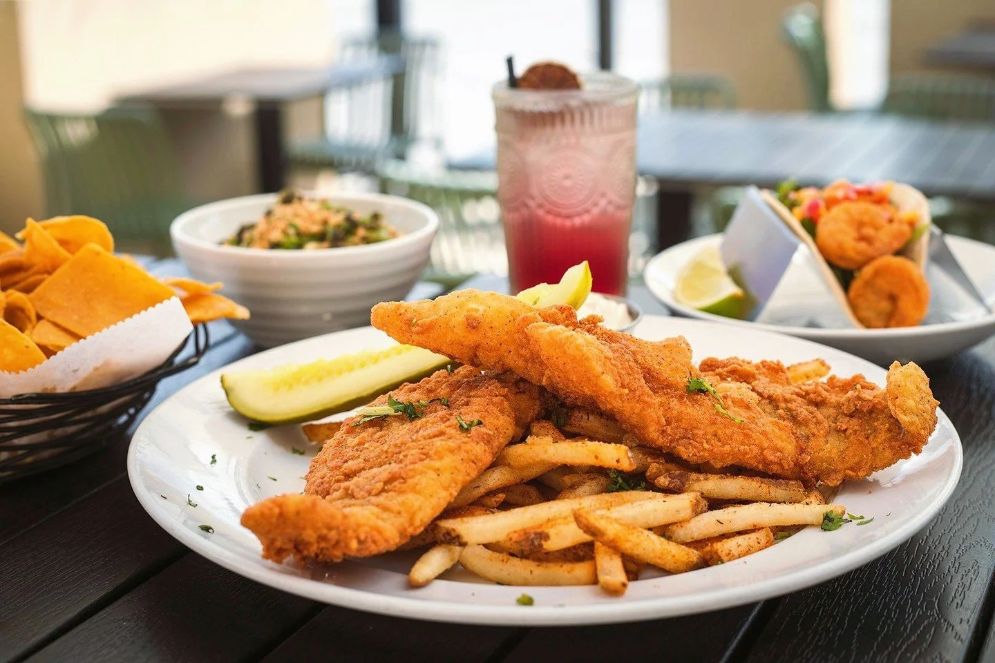 A little Labor Day Weekend plot twist: come to Mezcal and order the Fish &amp; Chips.⁠
⁠
We&rsquo;ve also got Fried Shrimp Tacos with peach salsa and a new Chef&rsquo;s Guacamole topped with crispy garlic &amp; fried capers.⁠
⁠
Swing through Mezcal a