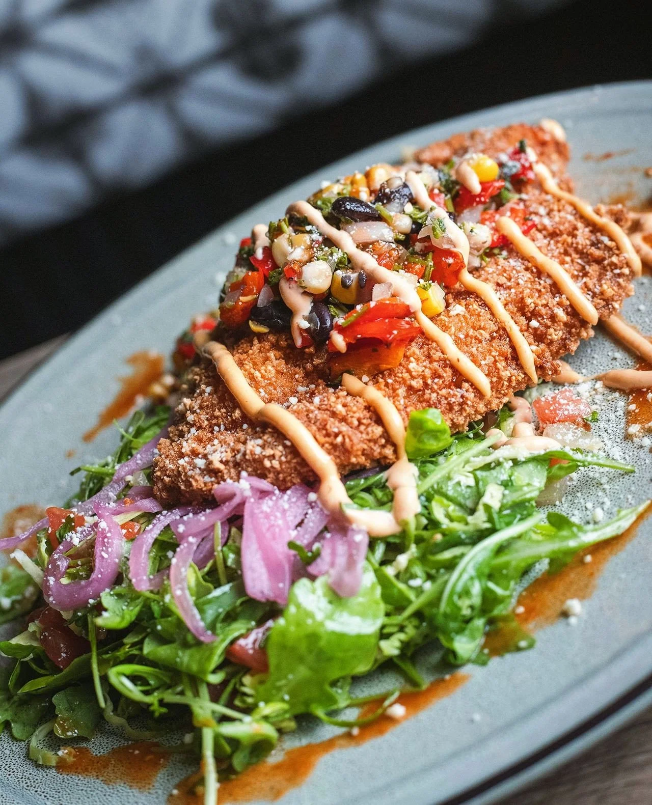 A little something different from your usual taco order.⁠
⁠
Two NEW reasons to make Mezcal part of your dinner plans:⁠
⁠
MEXICAN CHICKEN MILANESE &ndash; Golden-fried chicken breast with cumin chili sea salt, a shaved Brussels sprout &amp; arugula sa