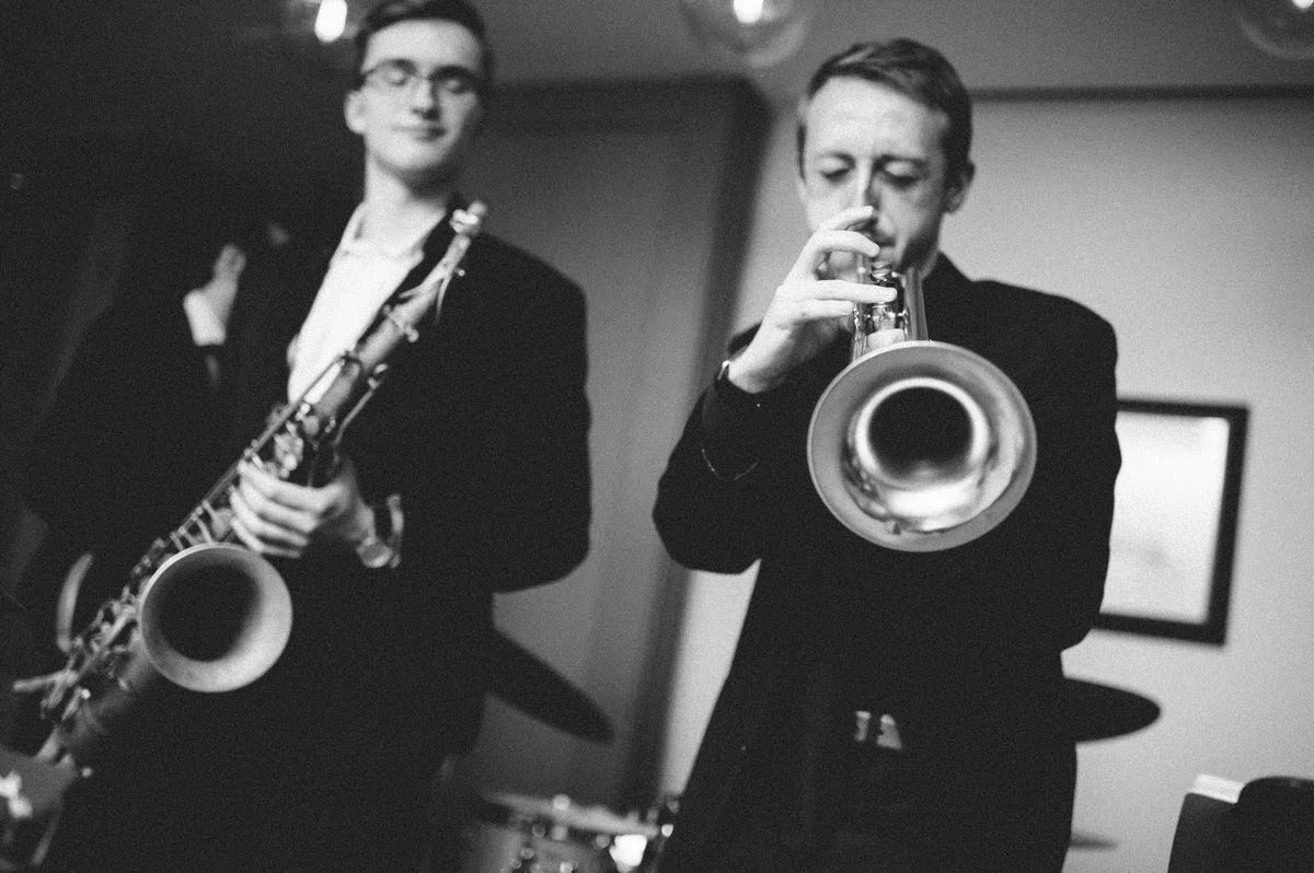 Saxophone and Trumpet play jazz at reception