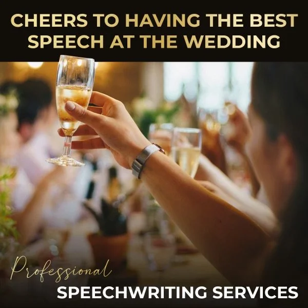 Person holding a glass of champagne at a wedding reception, with other guests raising glasses in the background.