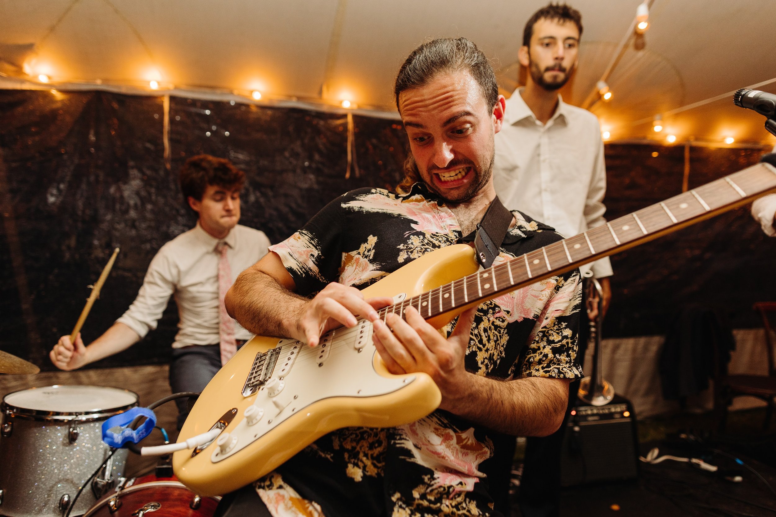 Electric guitar with drums and singer high energy wedding band for dance floor