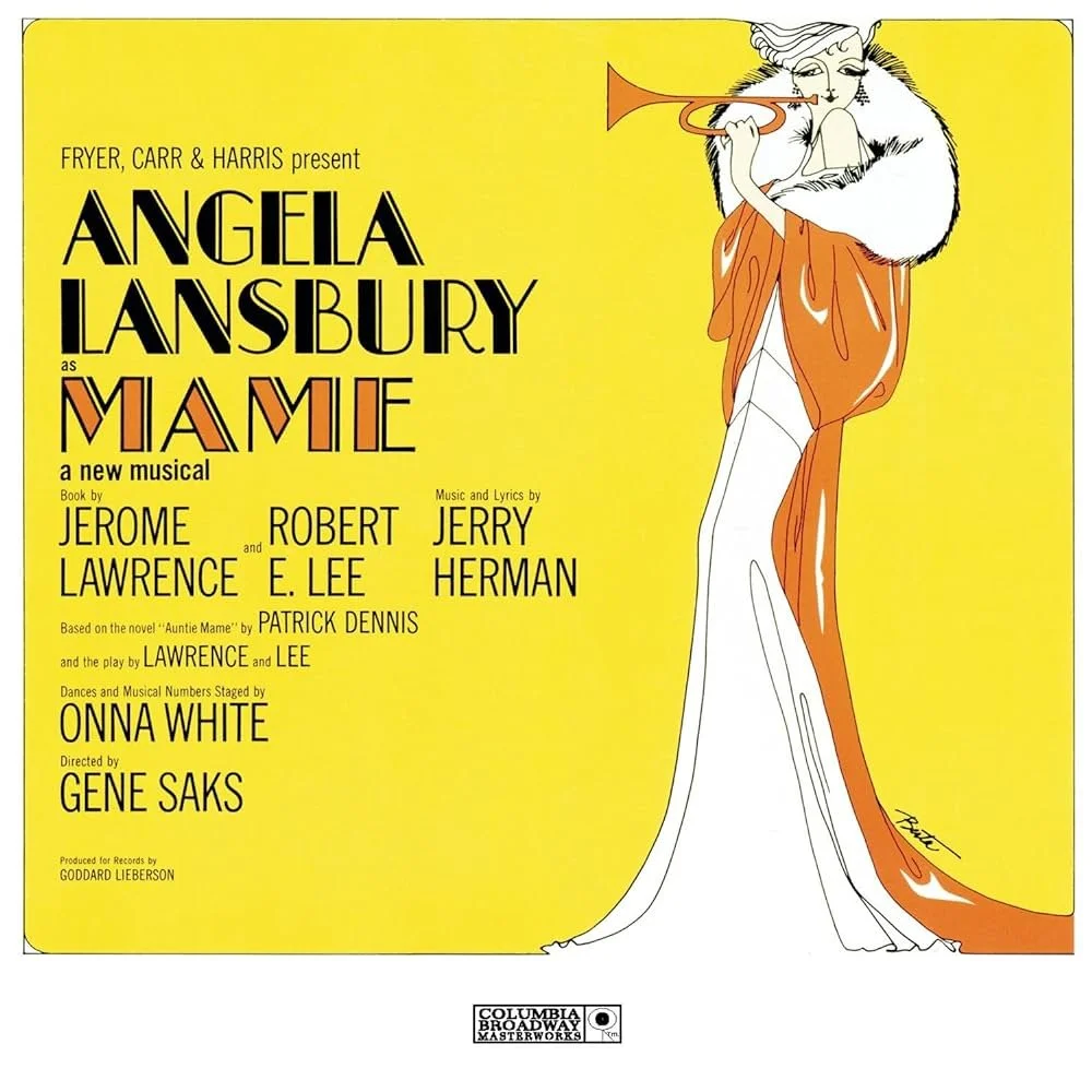Promotional poster for the musical 'Mame' featuring Angela Lansbury, with an illustration of a woman playing a trumpet, wearing a white and orange gown, set against a yellow background.