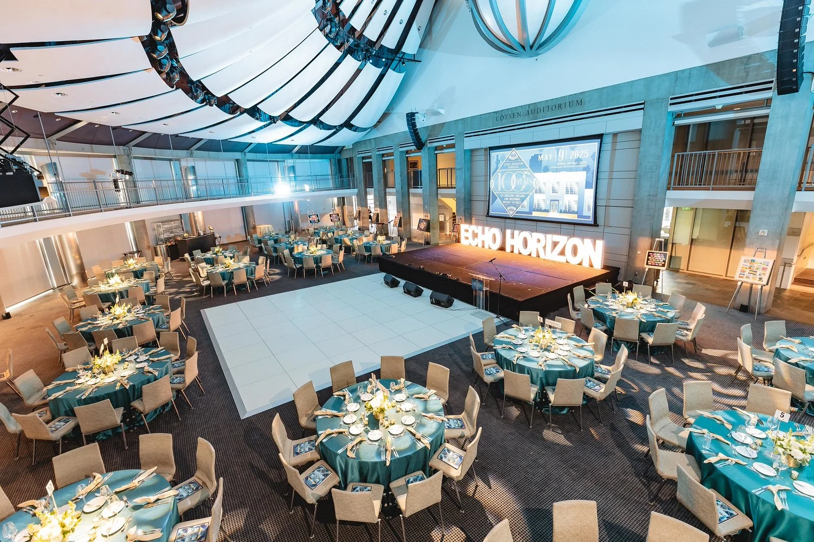 Echo Horizon gala aerial shot of blue and white themed event room before attendees arrive.