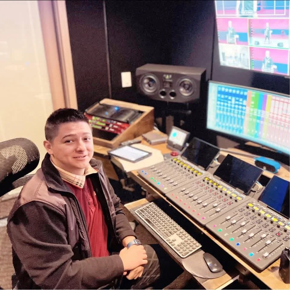 Travis “RedWood” Counts is at a music console in Luminous Sounds Dallas, TX